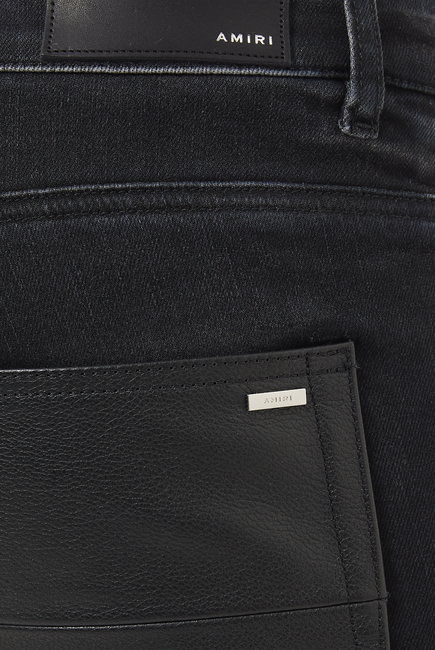 بنطال جينز جلد بتطريز شعار الماركة