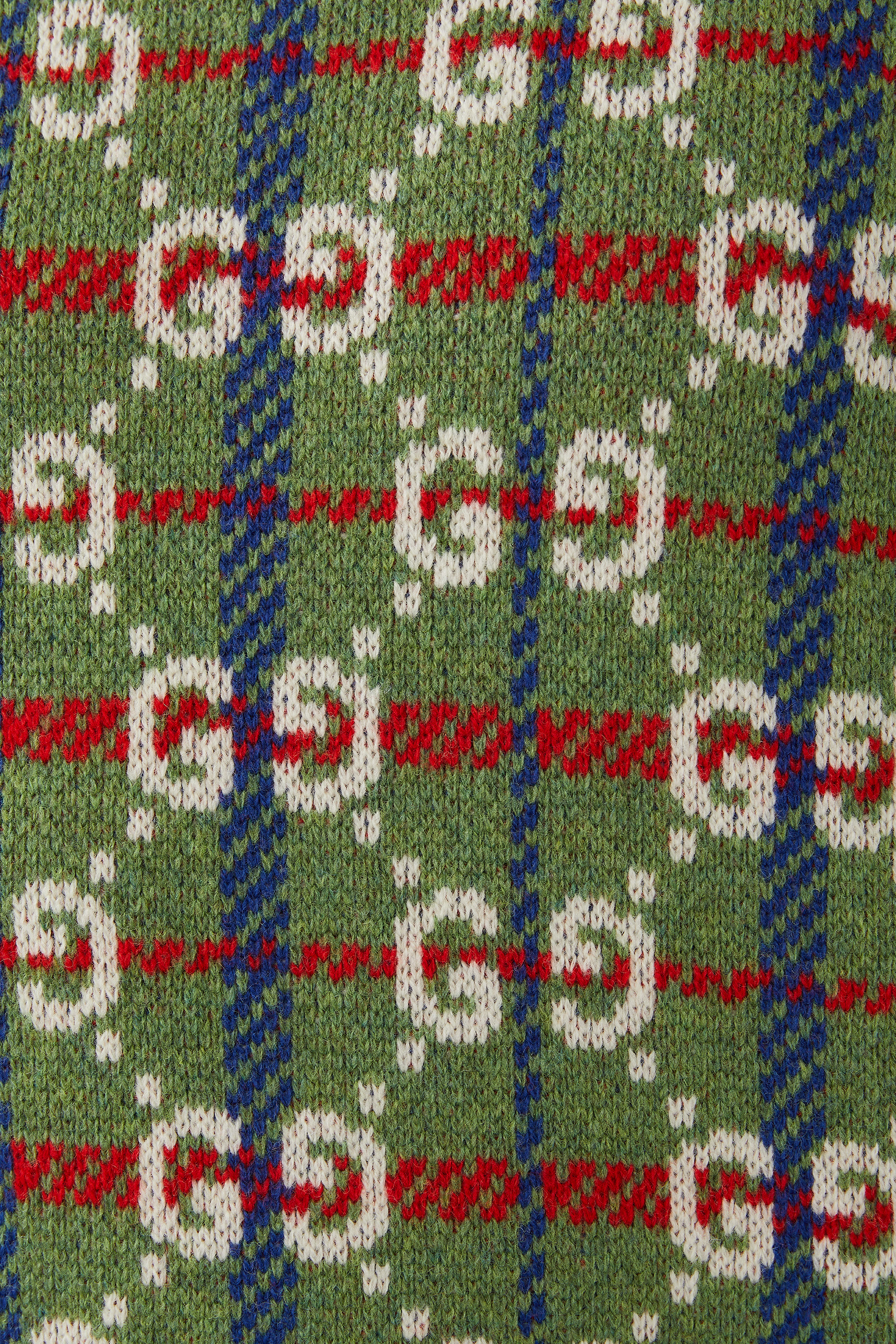 كنزة كاروهات بطبعات حروف الماركة