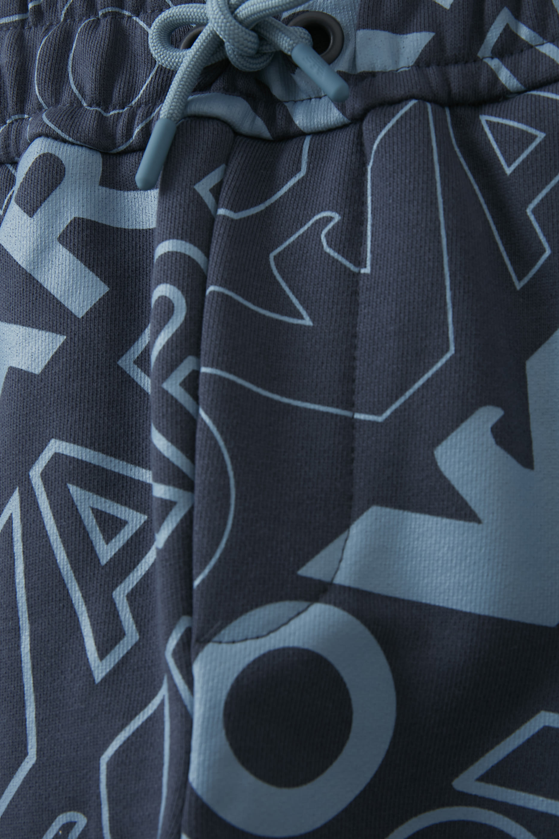 بنطال رياضي برباط تضييق وشعار الماركة للأطفال