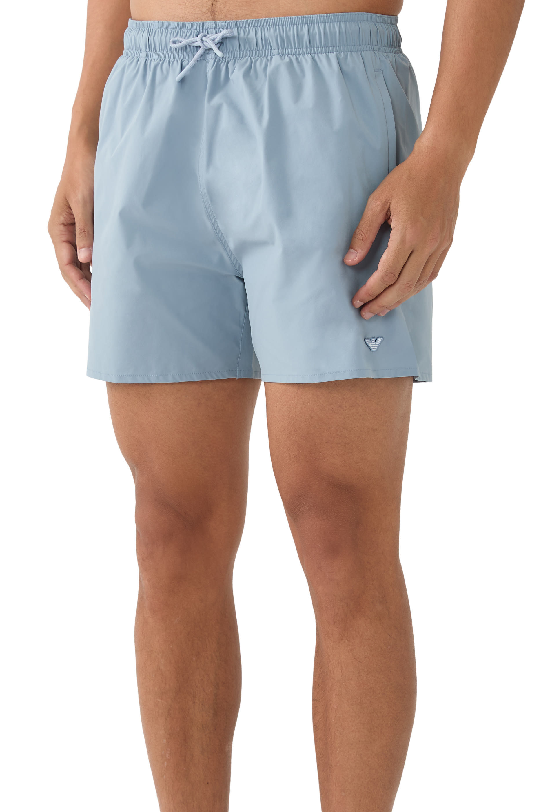 شورت سباحة بشعار الماركة ونسر حجم صغير