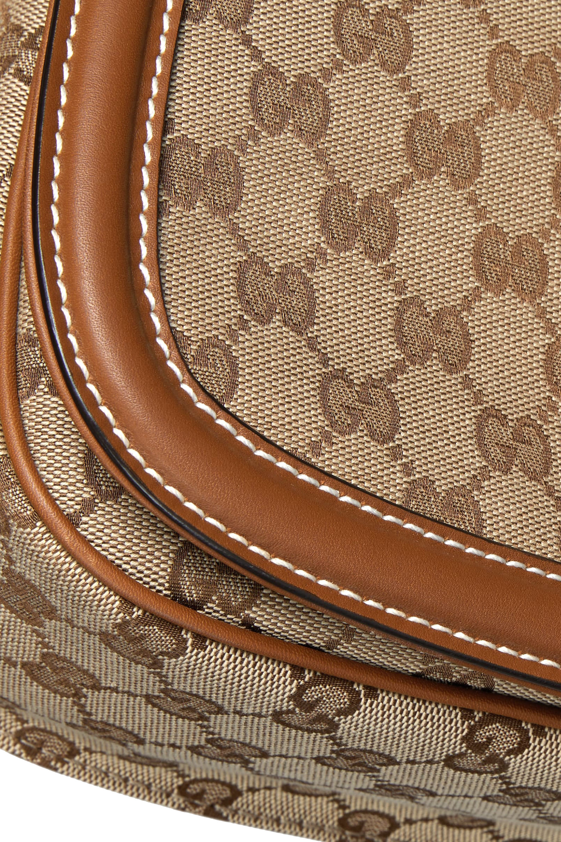 حقيبة يد بلوندي متوسطة بيد علوية