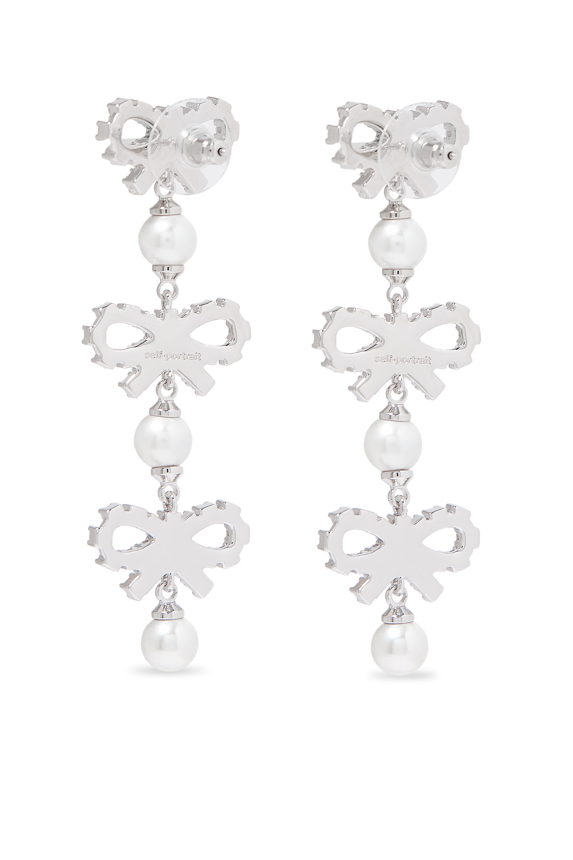 أقراط بتصميم متدرج بفيونكة صغيرة مرصعة بكريستال