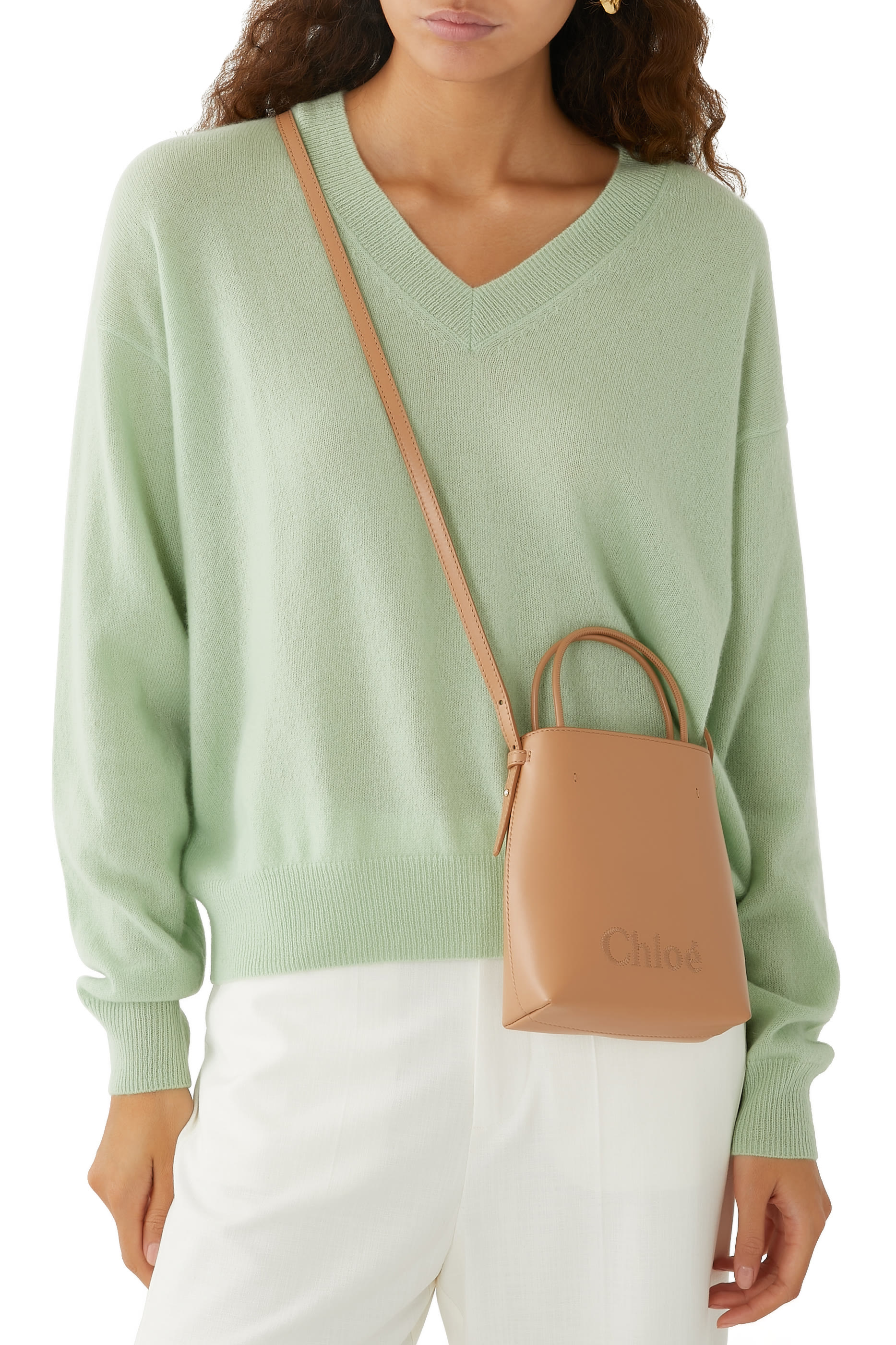 حقيبة سينس صغيرة بشعار الماركة المحاك