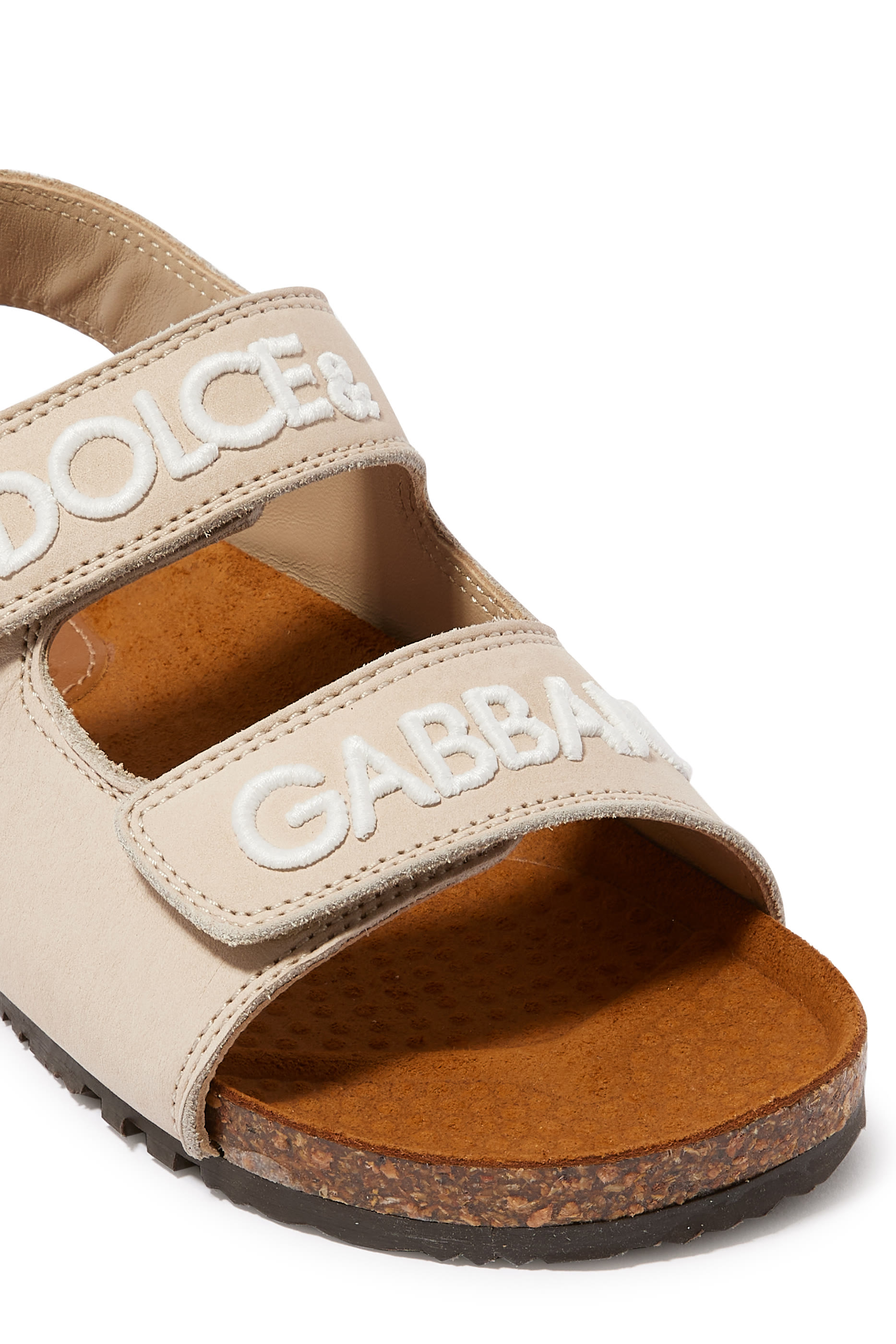 صندل جلد بنقشة شعار الماركة