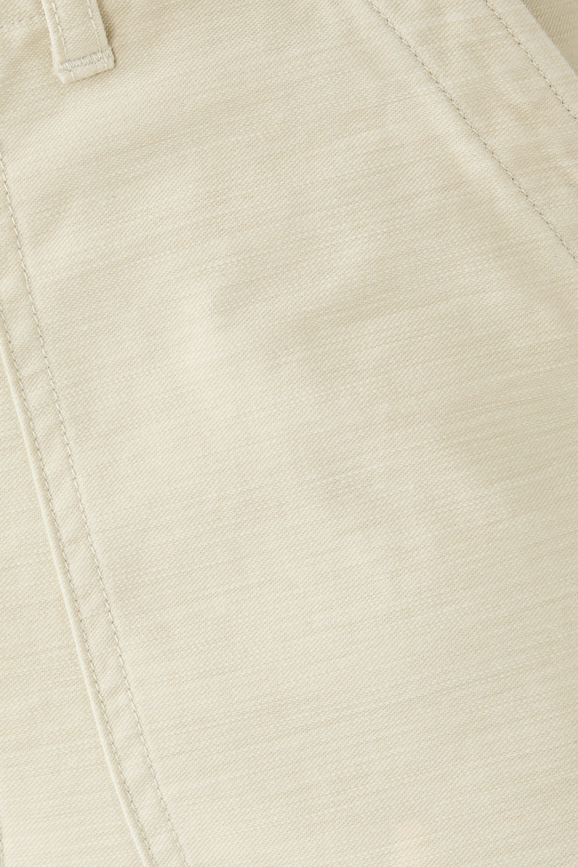 بنطال بيكر باغي بتأثير مبيض ساتان