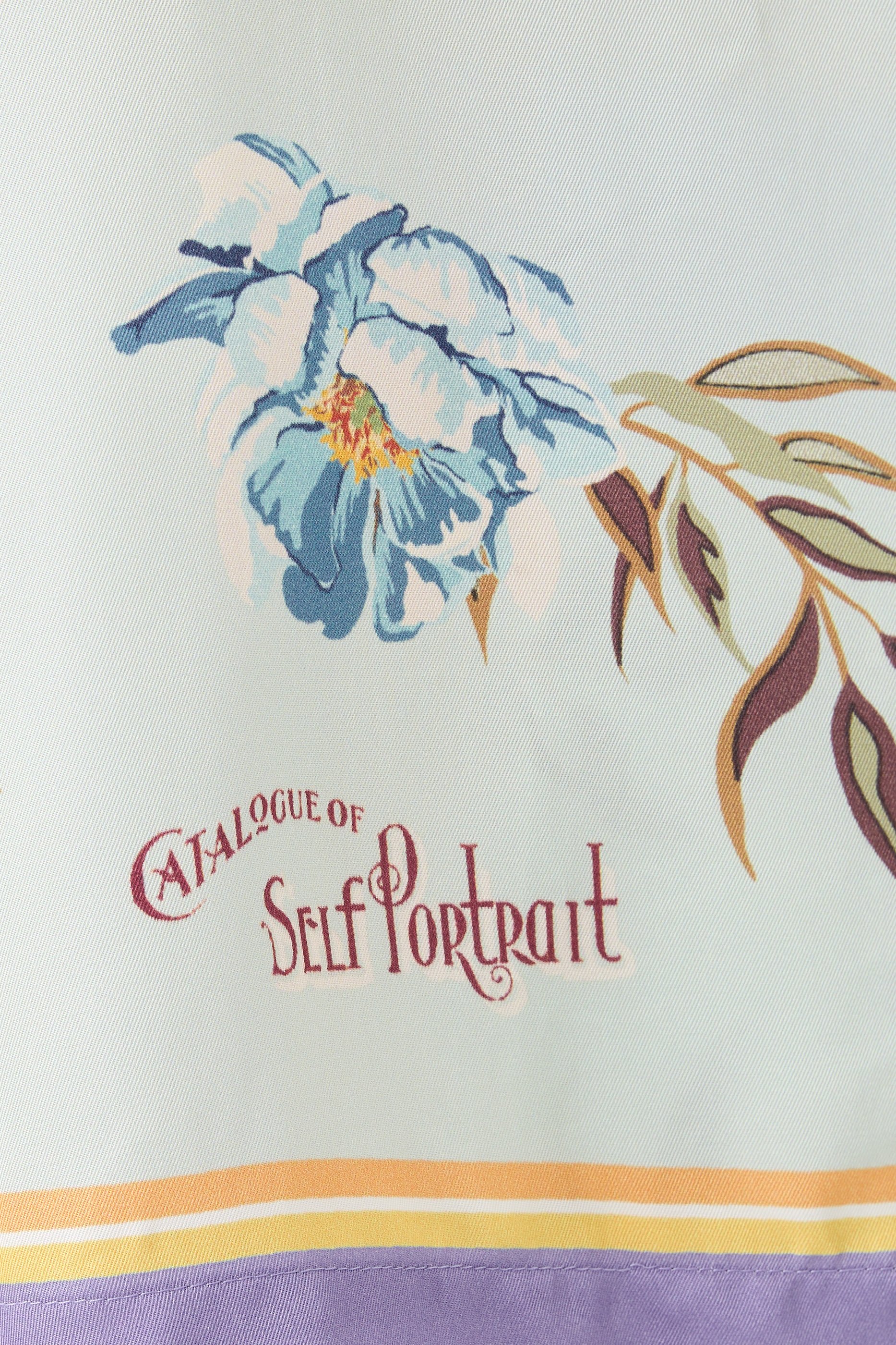 قميص بنقشة زهور حرير تويل