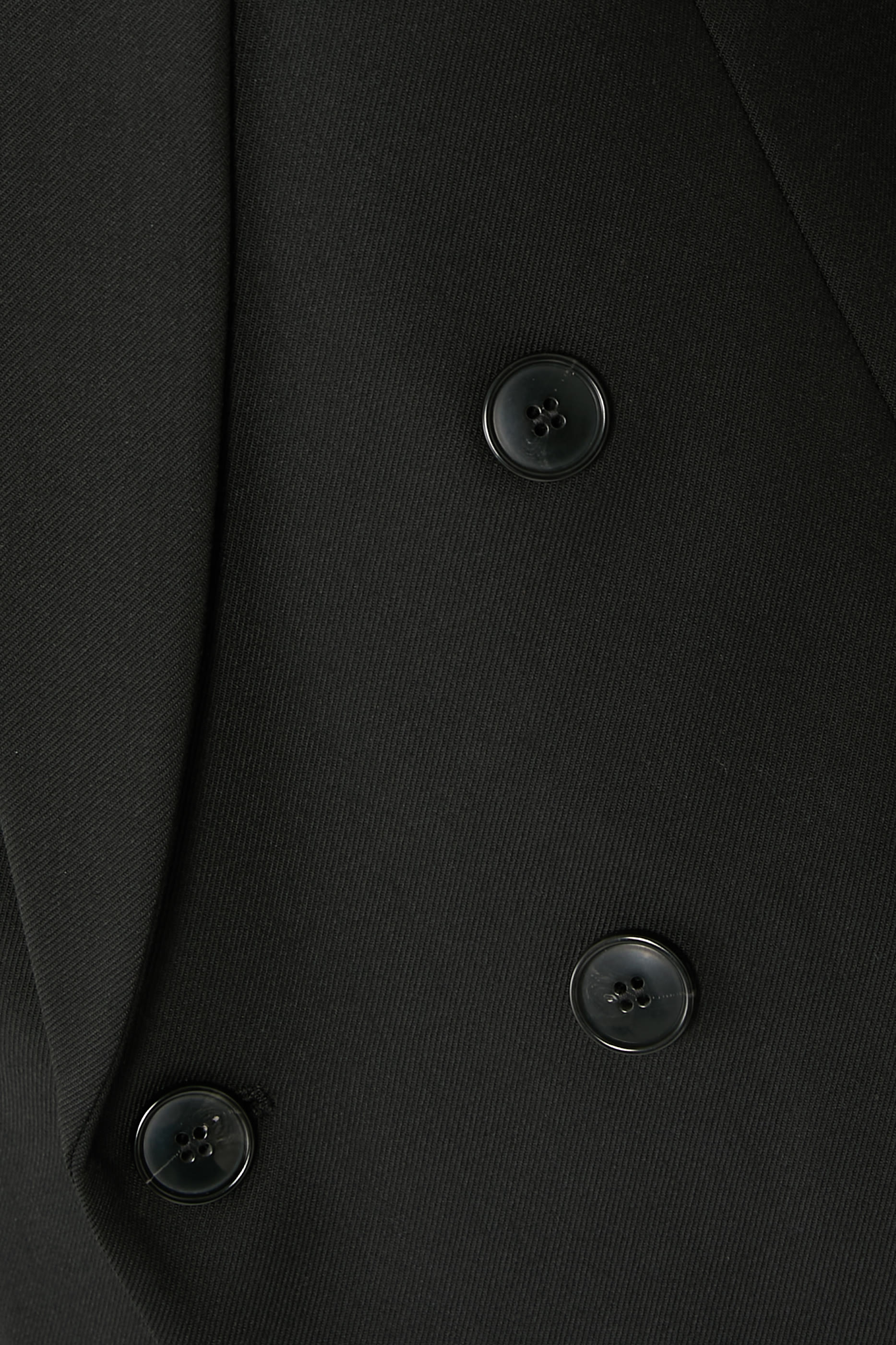 جاكيت بصف أزرار مزدوج وقصة مريحة