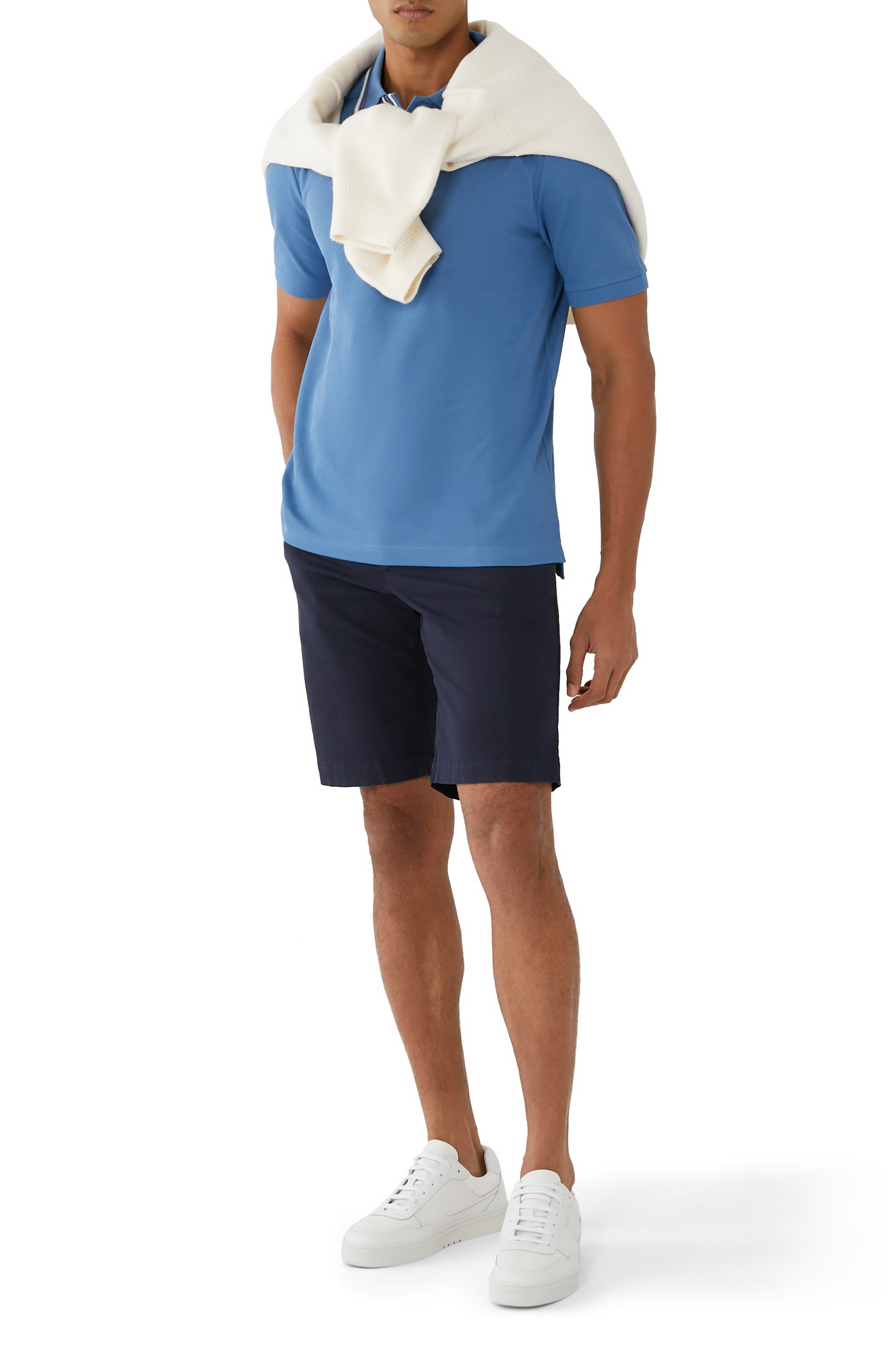 قميص بولو بحافة مخططة