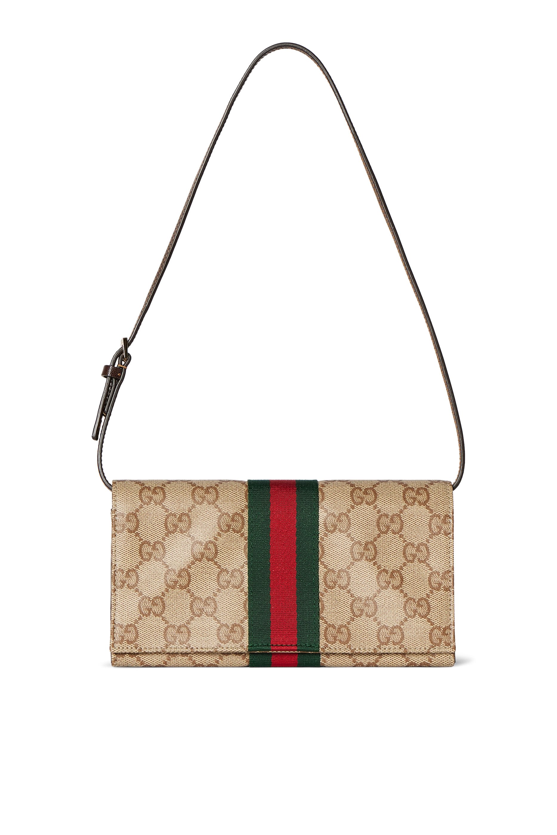 حقيبة صغيرة بحمالة وشريط ويب