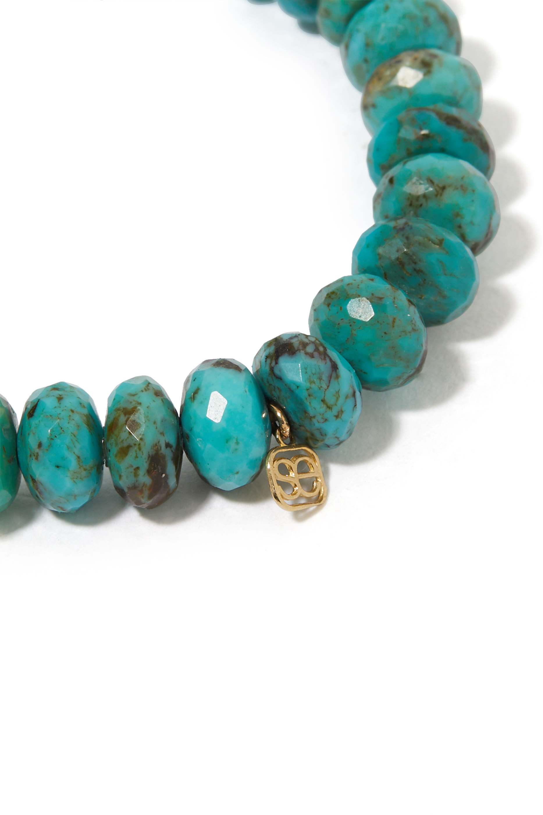 سوار بحلية بتصميم عين حسود مرصع بالماس والفيروز ذهب أصفر عيار 14