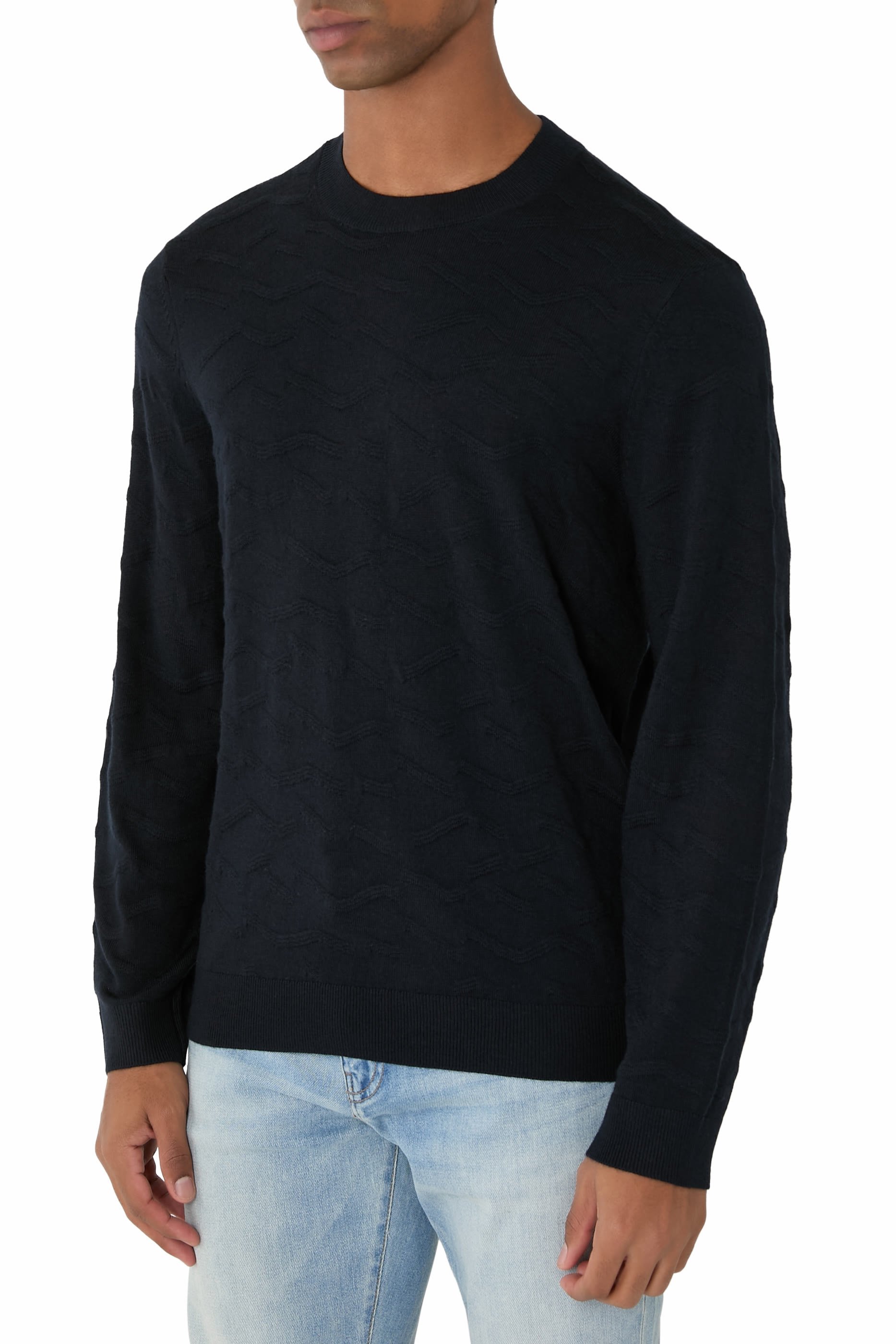 كنزة بتصميم متموج بارزة الملمس