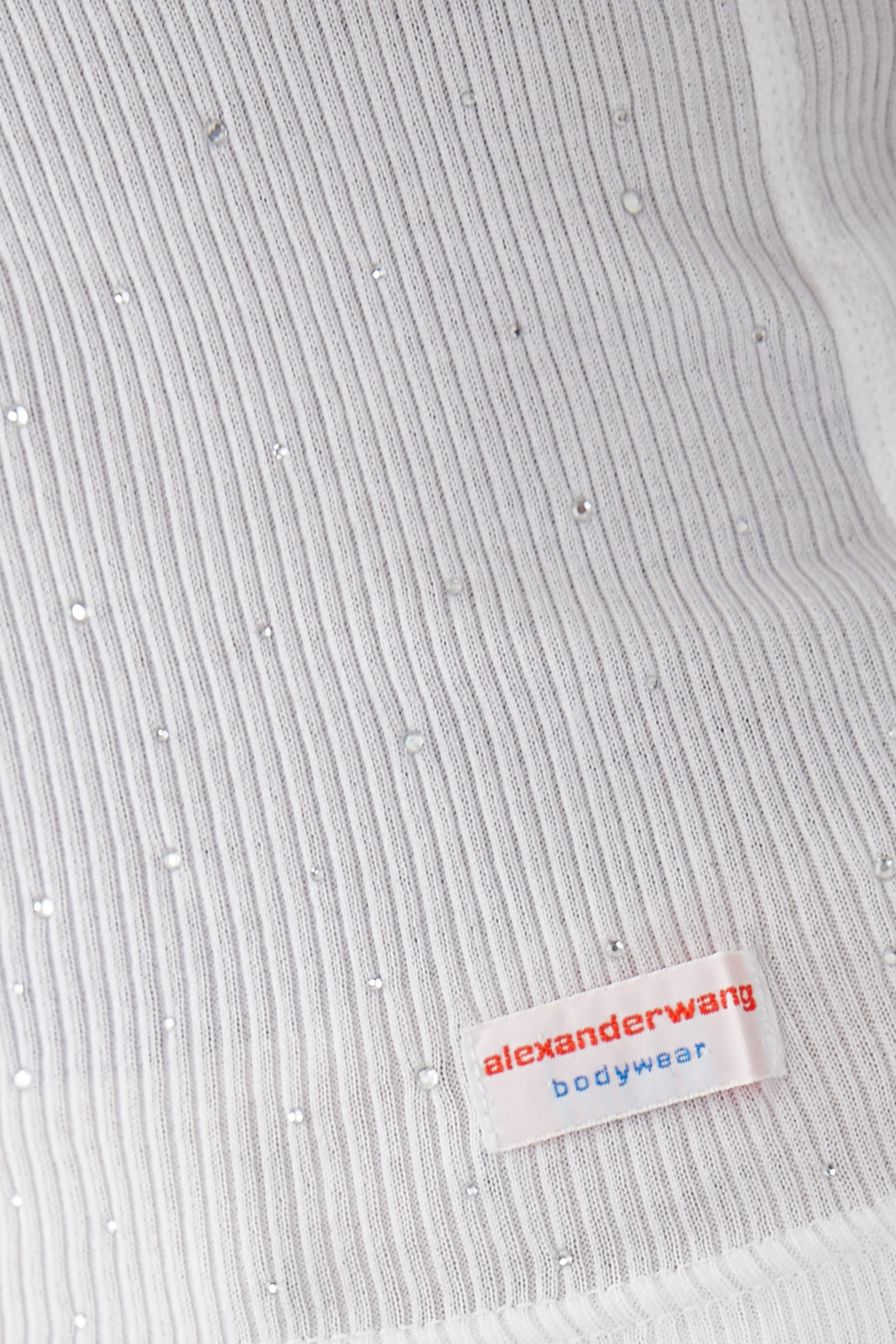 بلوزة ريسر  بلا أكمام مرصعة بكريستال مثبت حراريا