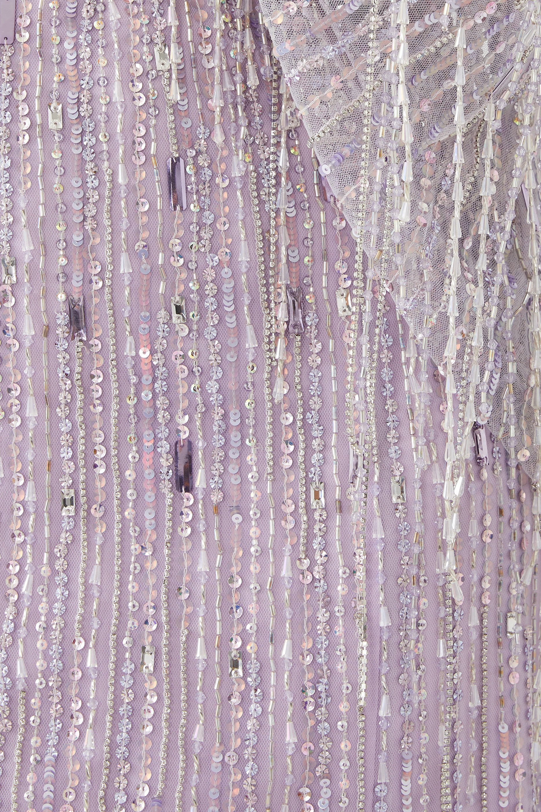 فستان سهرة رابسودي بتفاصيل زينة