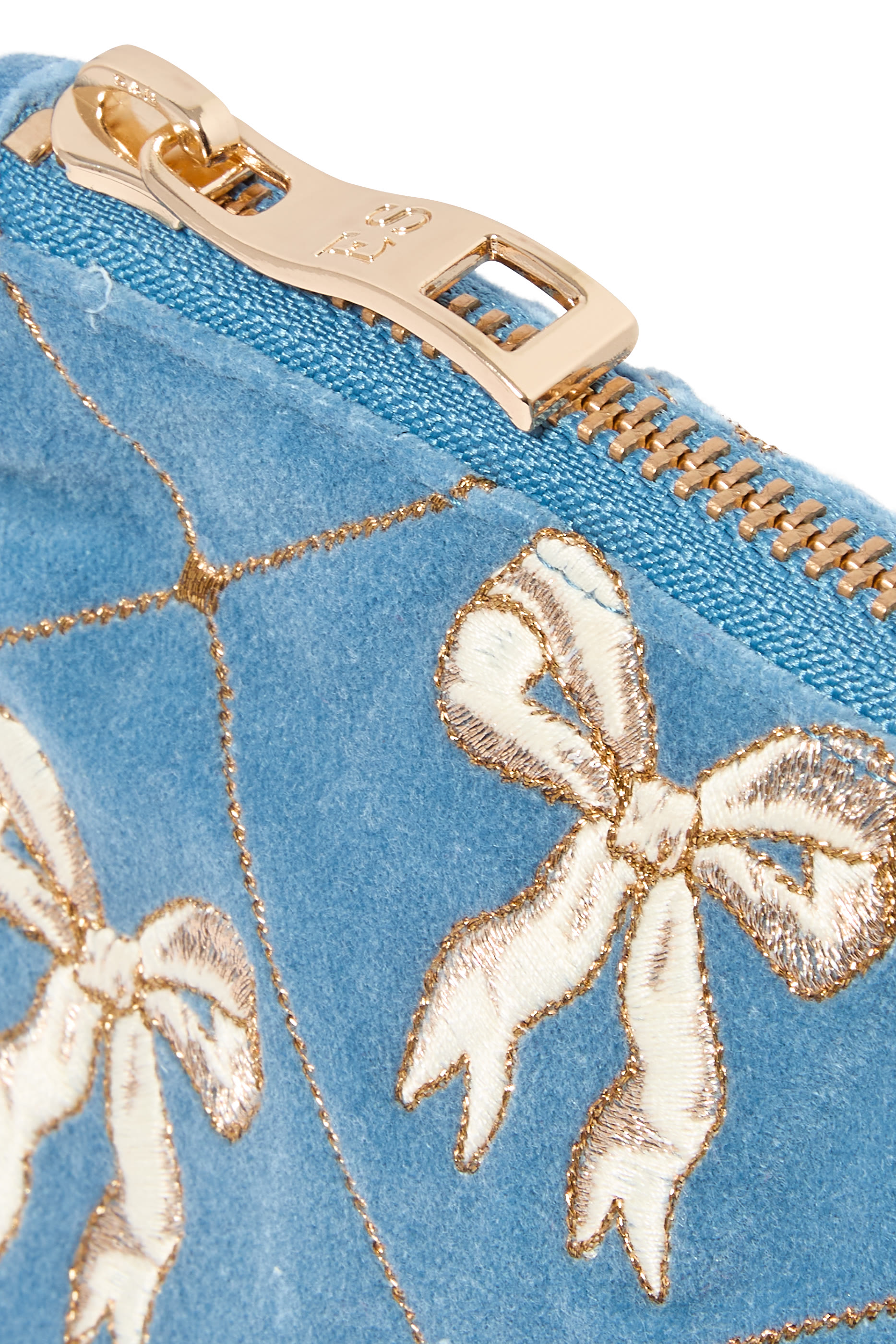 حقيبة صغيرة يومية بنقشة فيونكات متشابكة