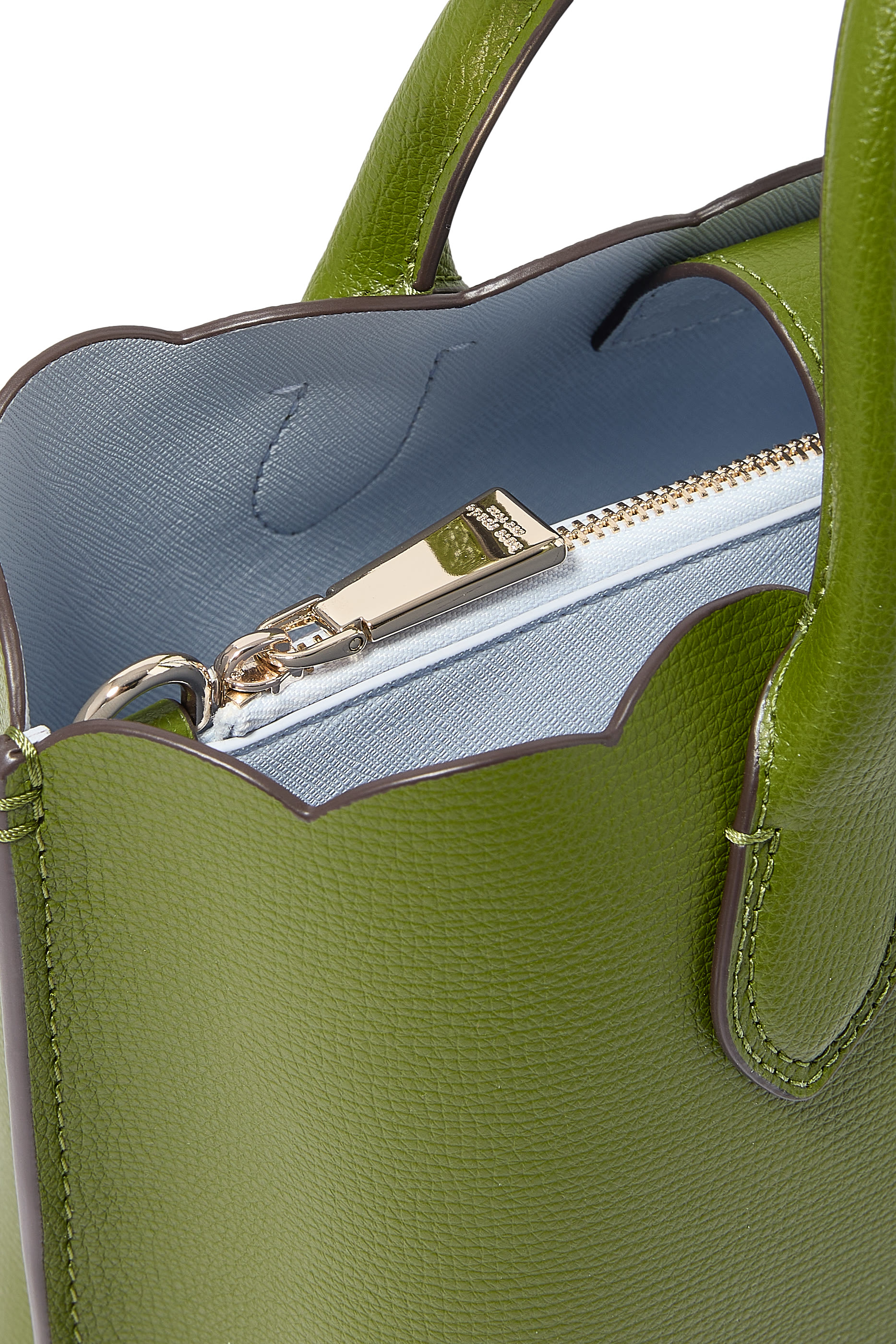 حقيية سويت كروس بحواف صدفية جلد بارز الملمس