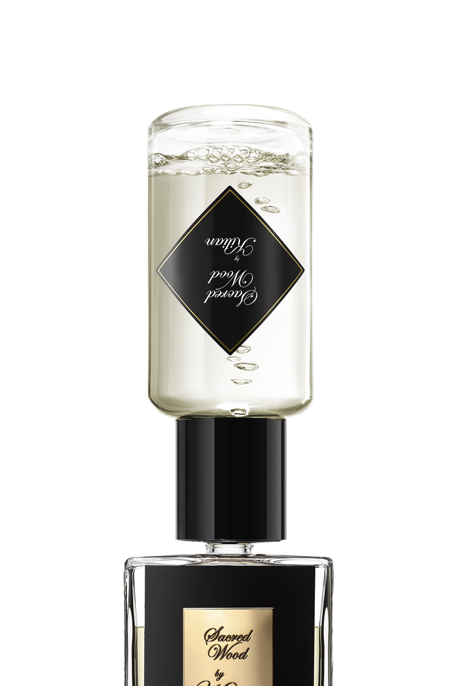 عبوة إعادة ملء عطر ساكرد وود