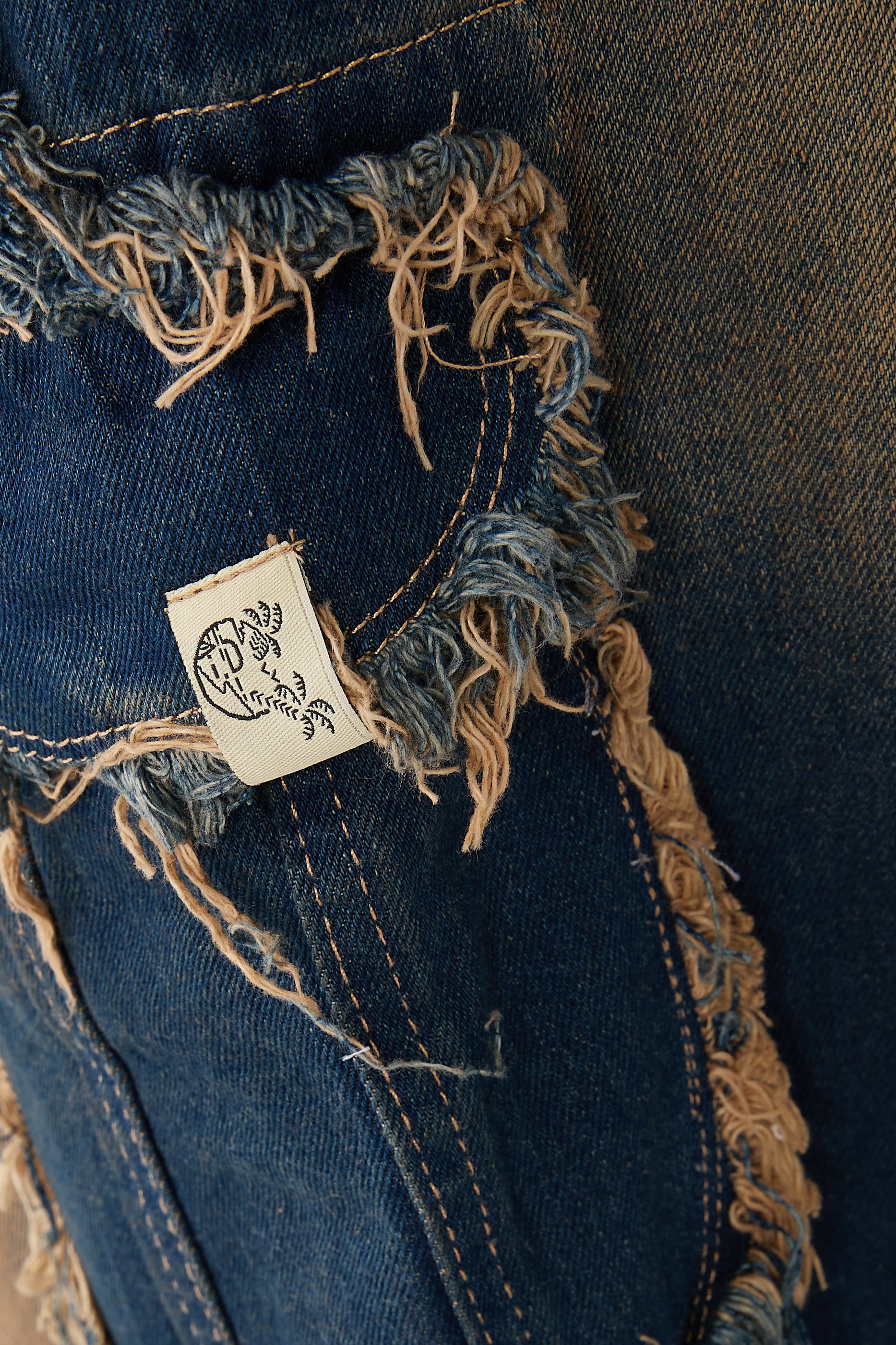 تنورة دنيم بحواف غير محاكة