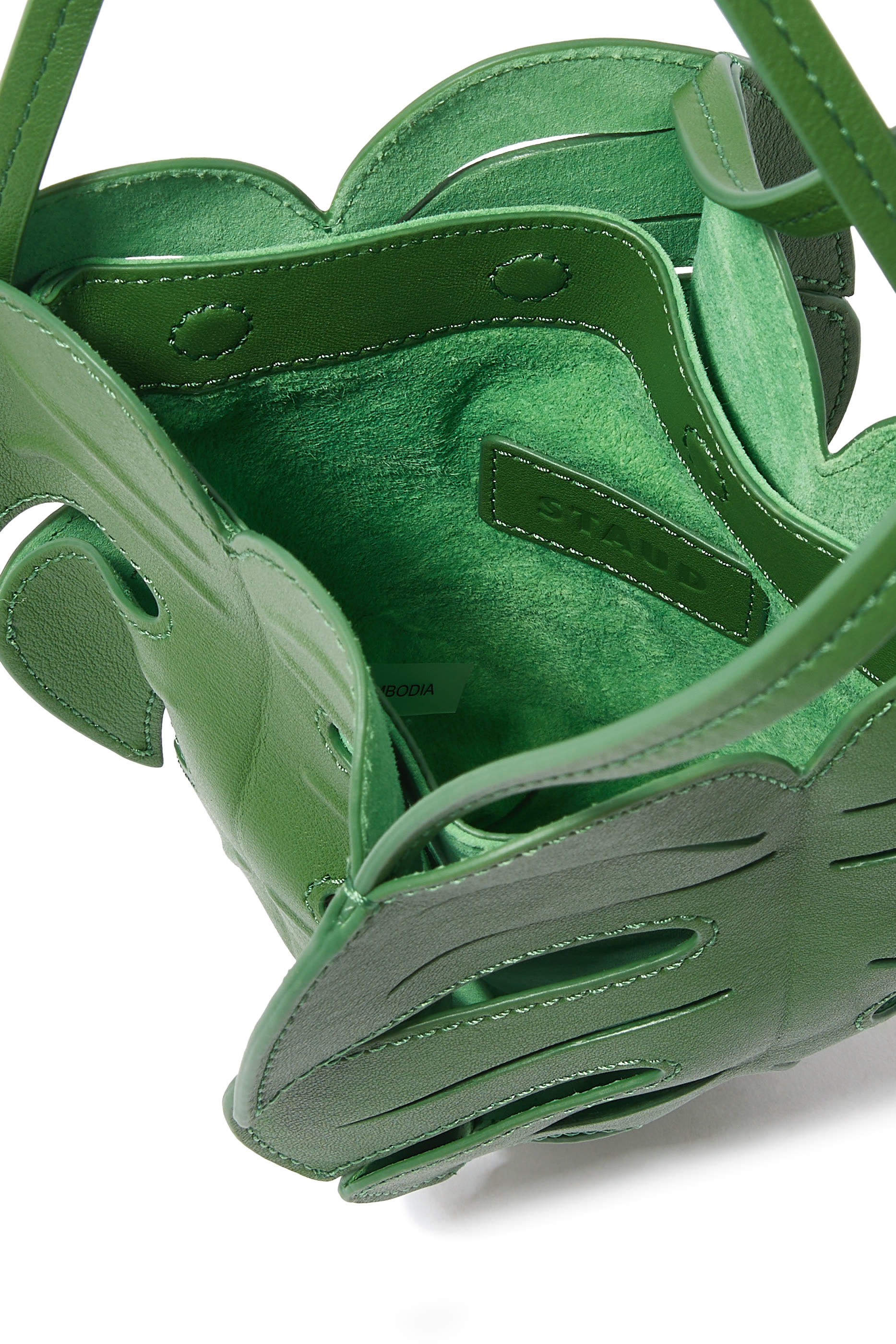 حقيبة بتصميم ورق النخيل جلد