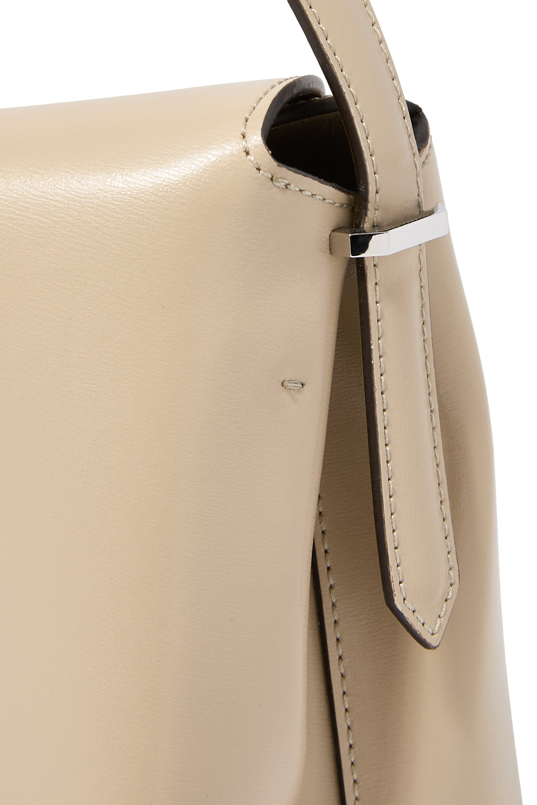 حقيبة يد بإغلاق على شكل حرف T جلد