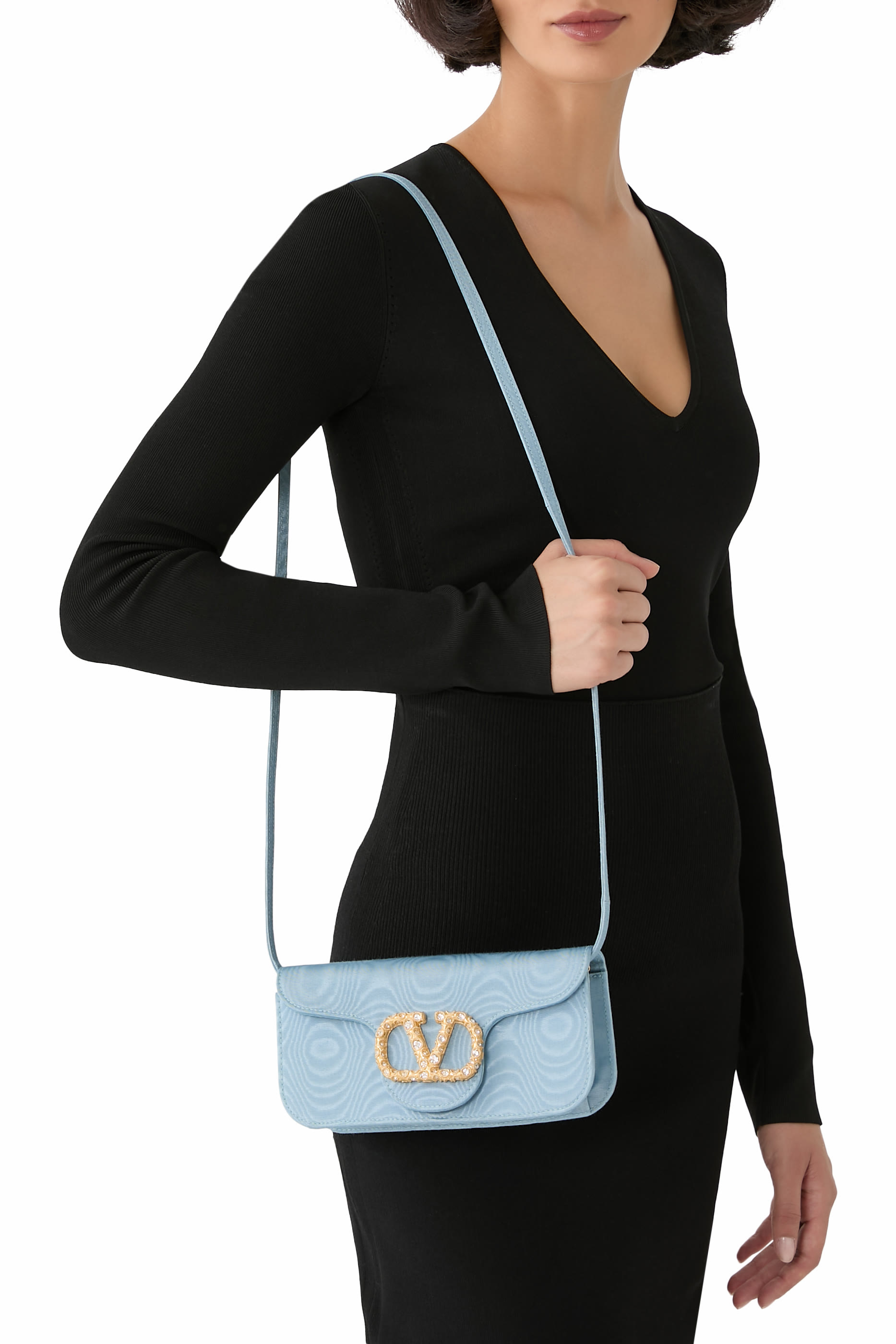 حقيبة كلاتش لوكو بحلية شعار الماركة بأحجار