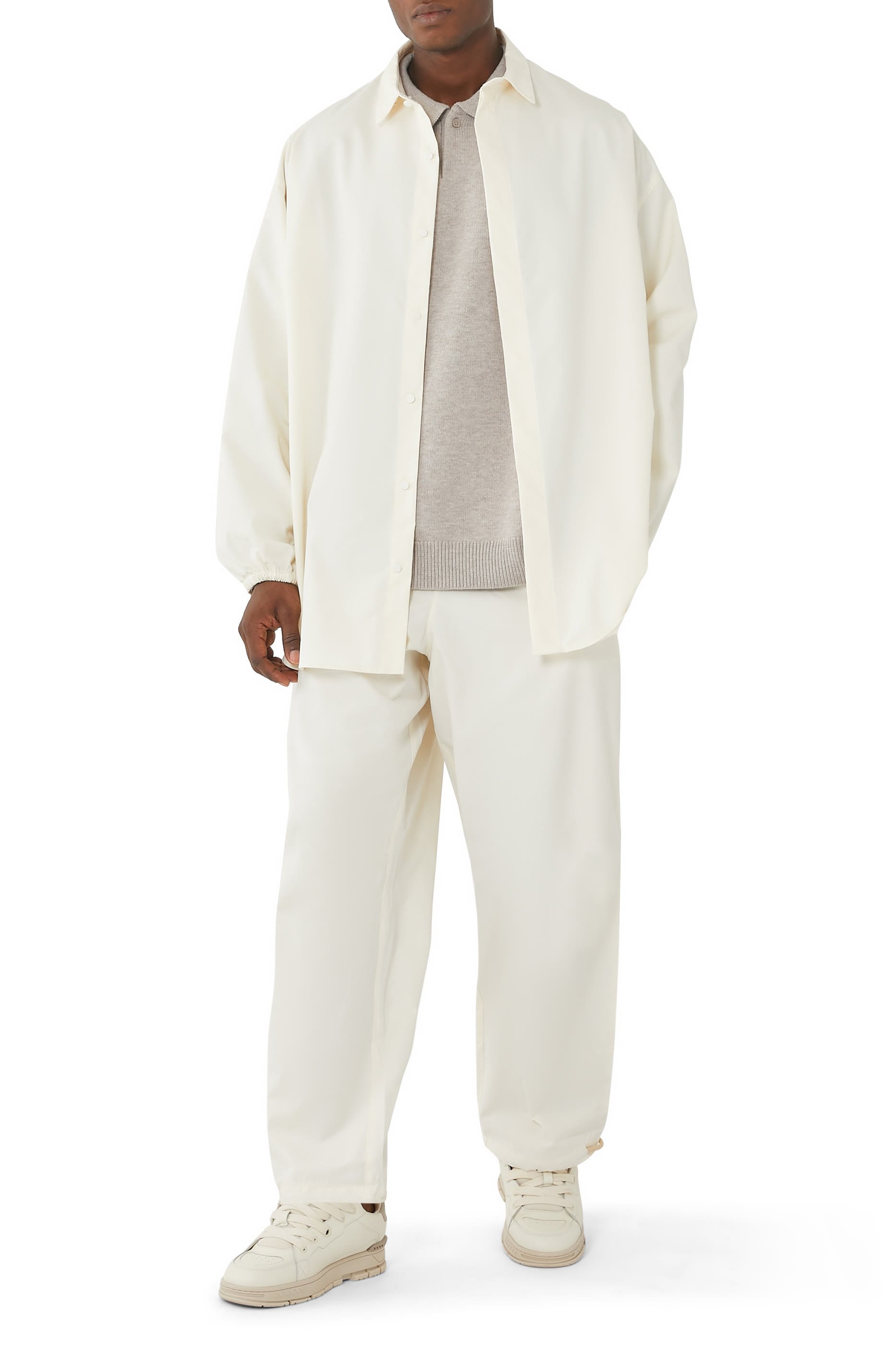 كنزة بولو منسوجة بشعار اسنشالز