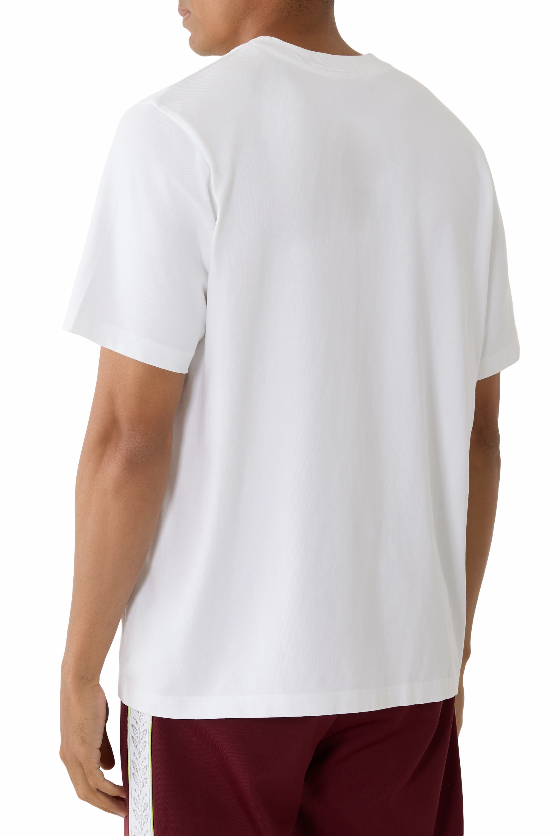 تيشيرت بنقشة شعار كازا واي وزهور أوركيد