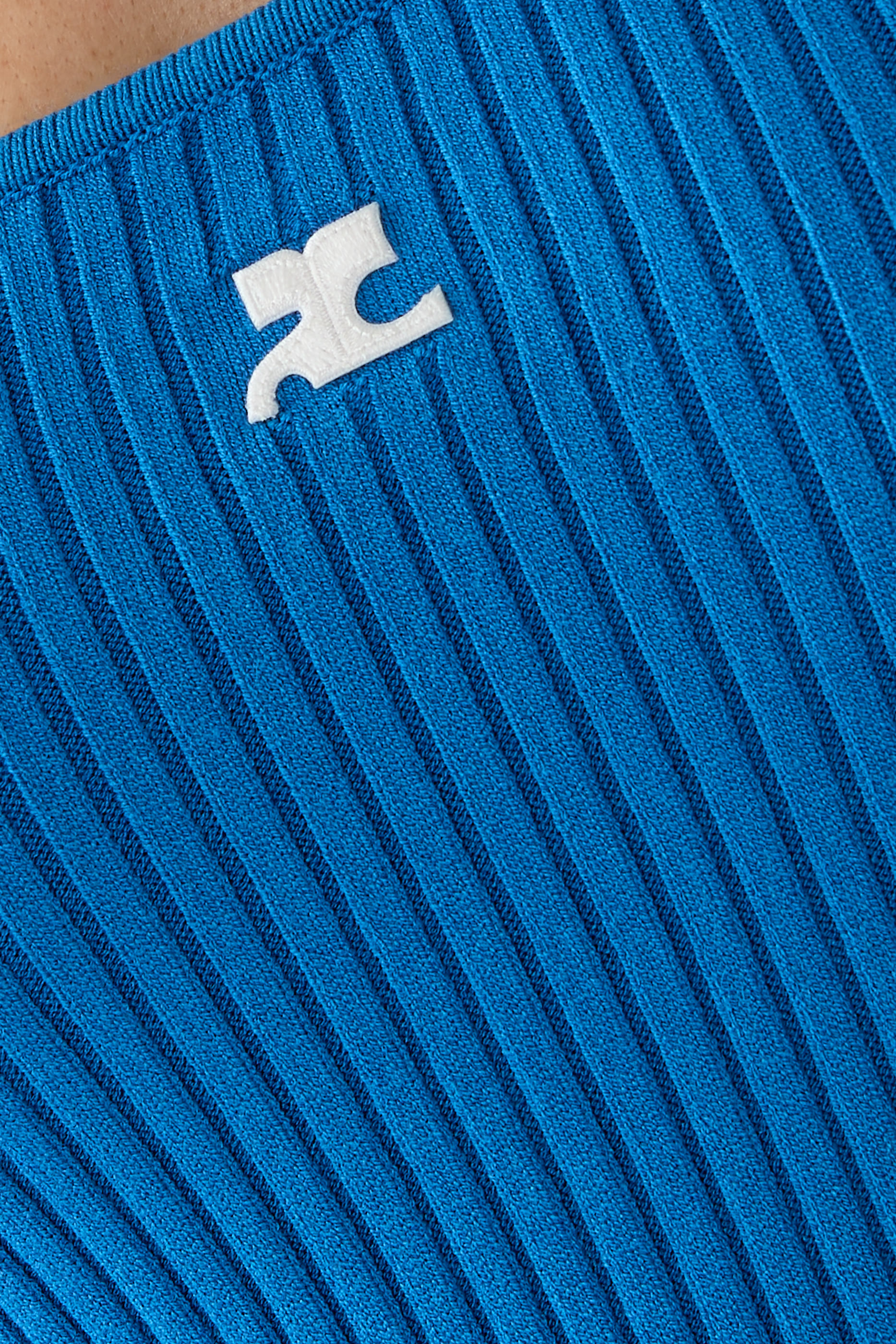 بلوزة ريديشن بلا أكمام نسيج مضلع