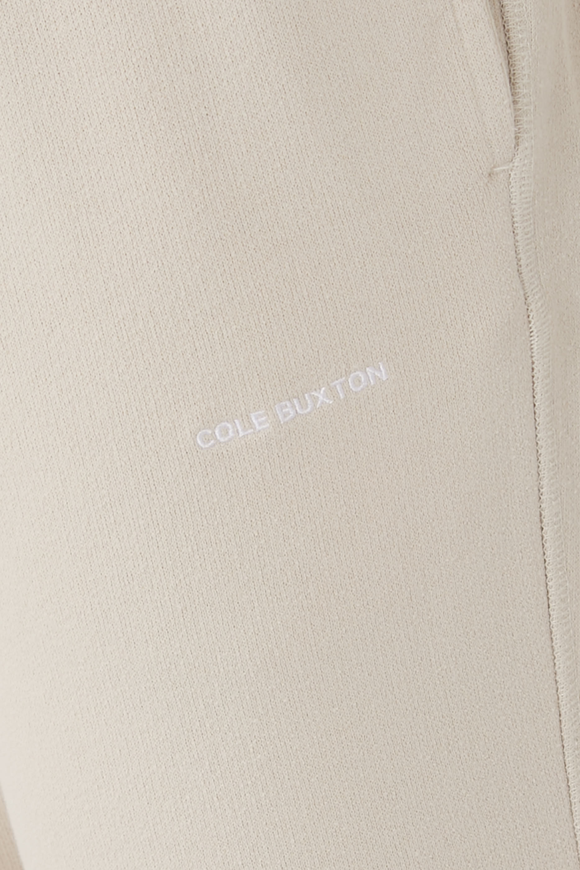 بنطال للبيت مزين بشعار الماركة بحجم صغير