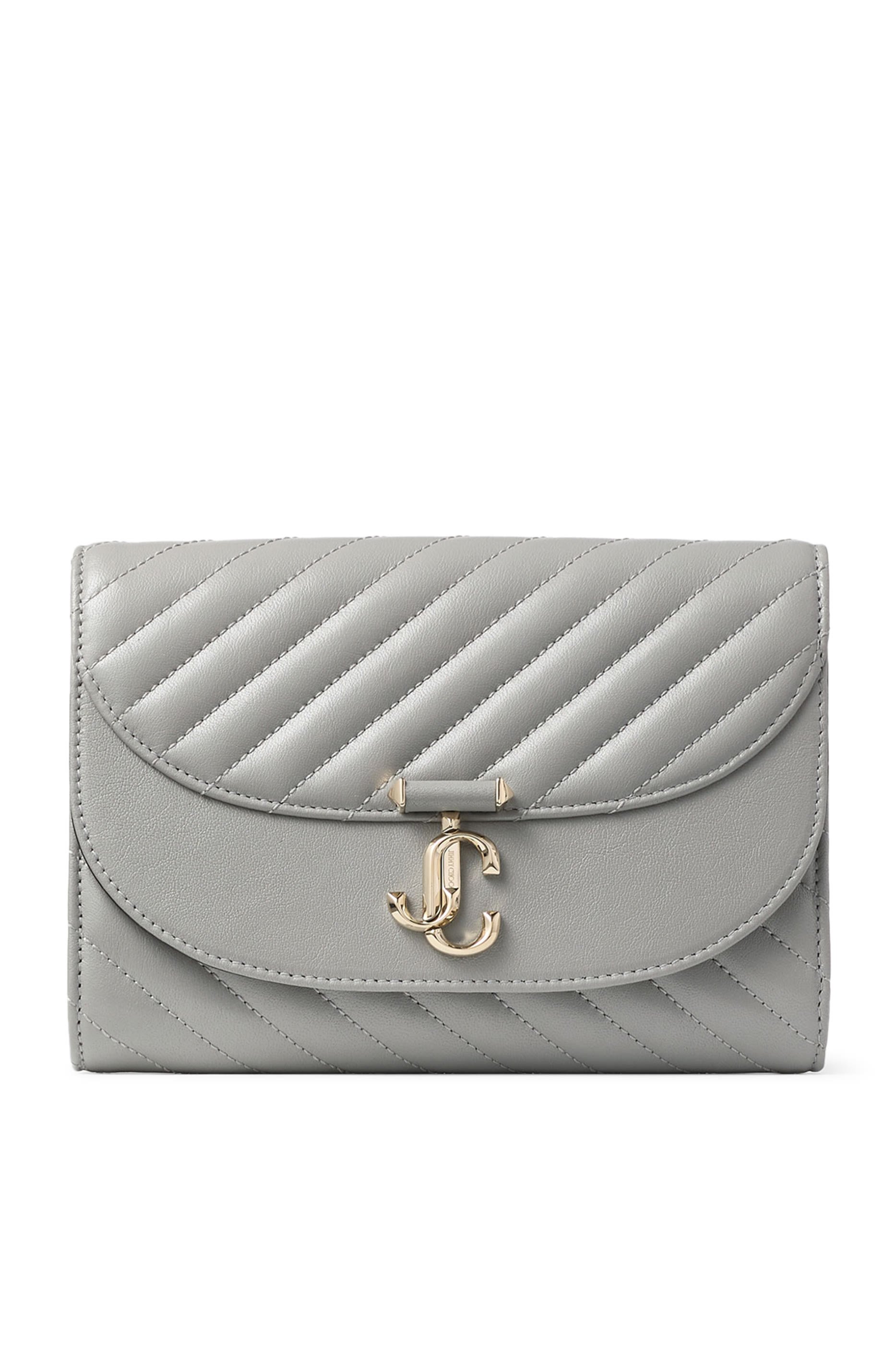 كلاتش بحافة مقوسة وحمالة سلسلة جلد