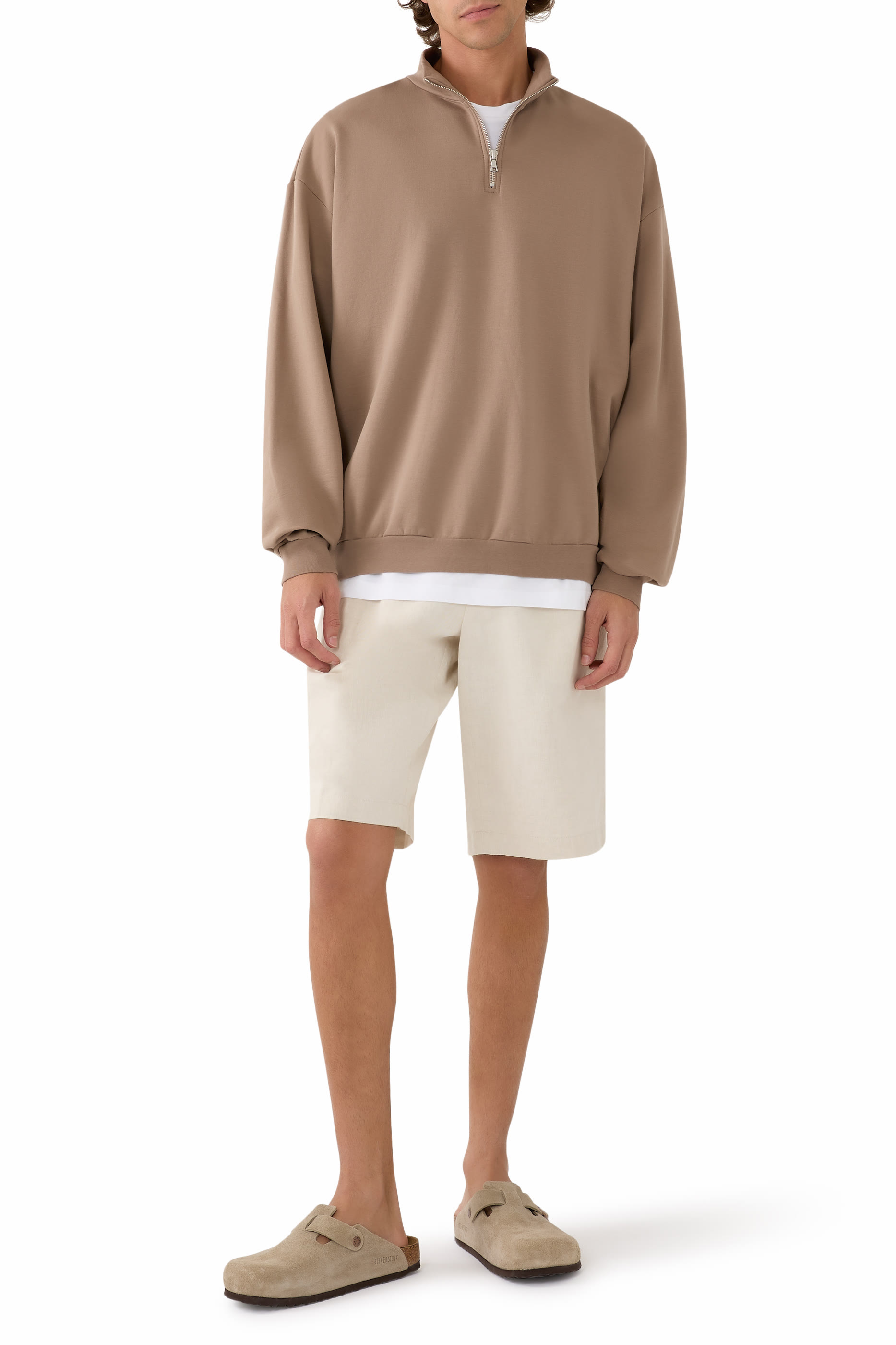 سترة بولو بنصف سحاب وياقة عالية قماش سميك مطاطي