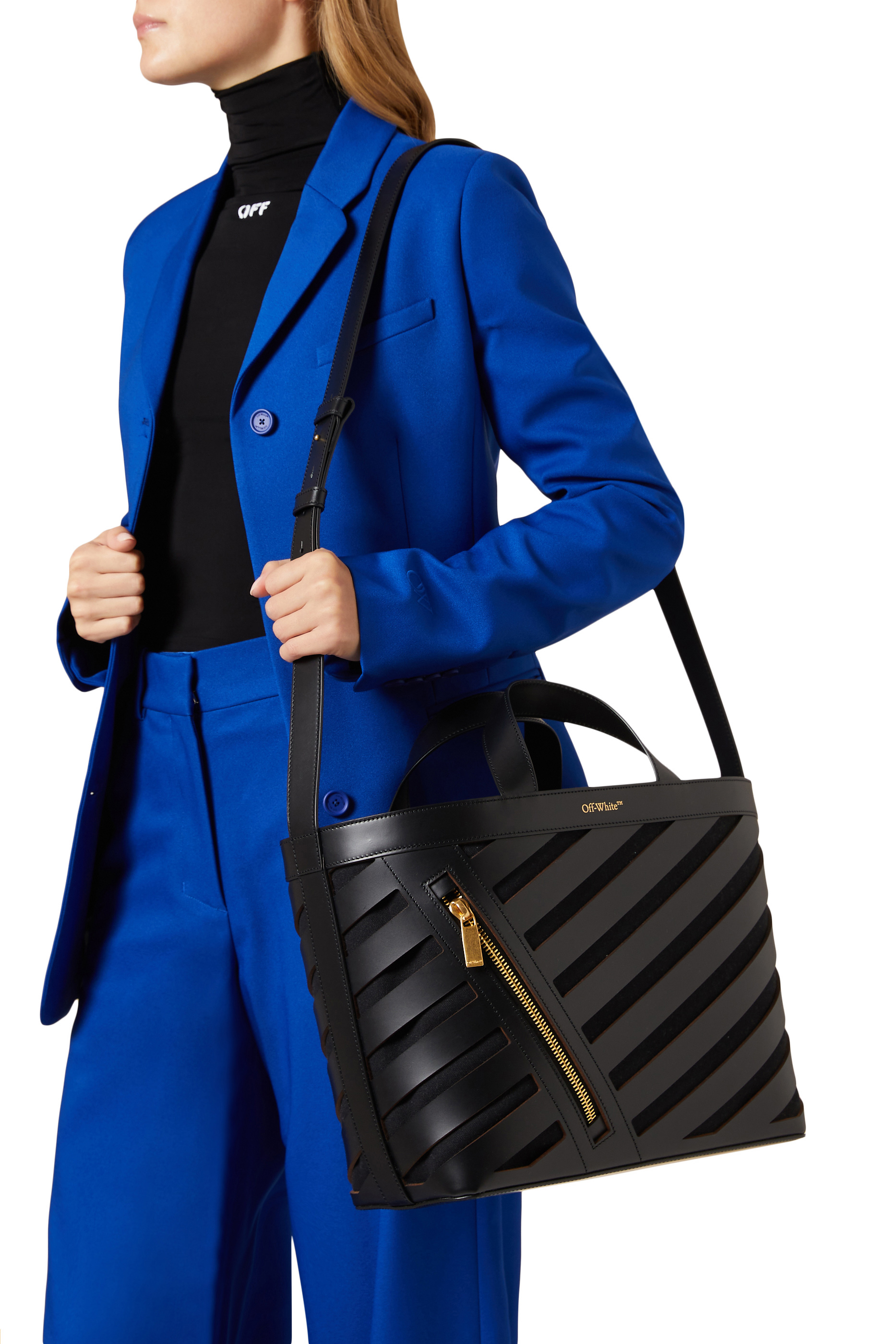 حقيبة يد صغيرة بفتحات مائلة