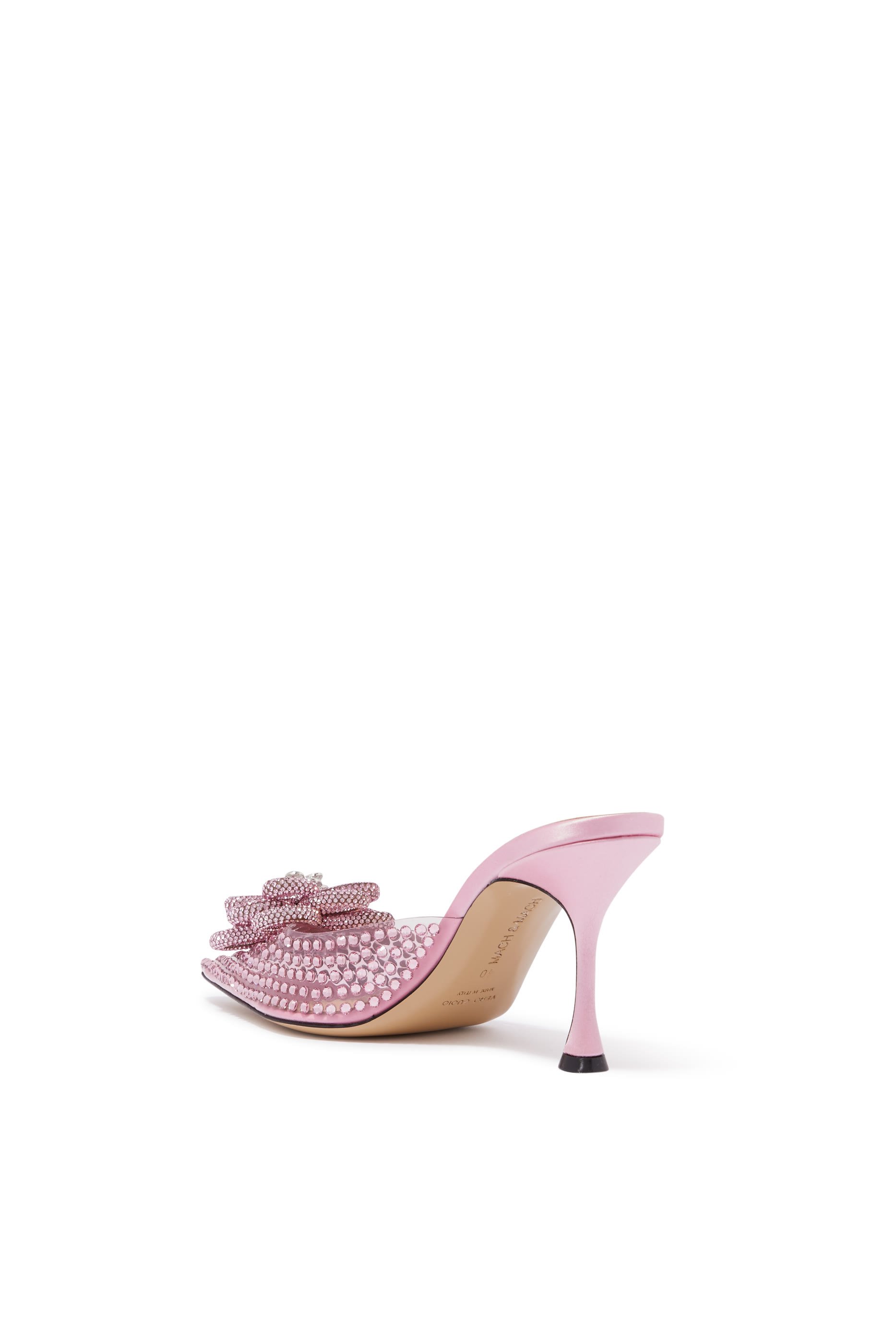 حذاء كاري مفتوح من الخلف مزين بزهرة بلون وردي