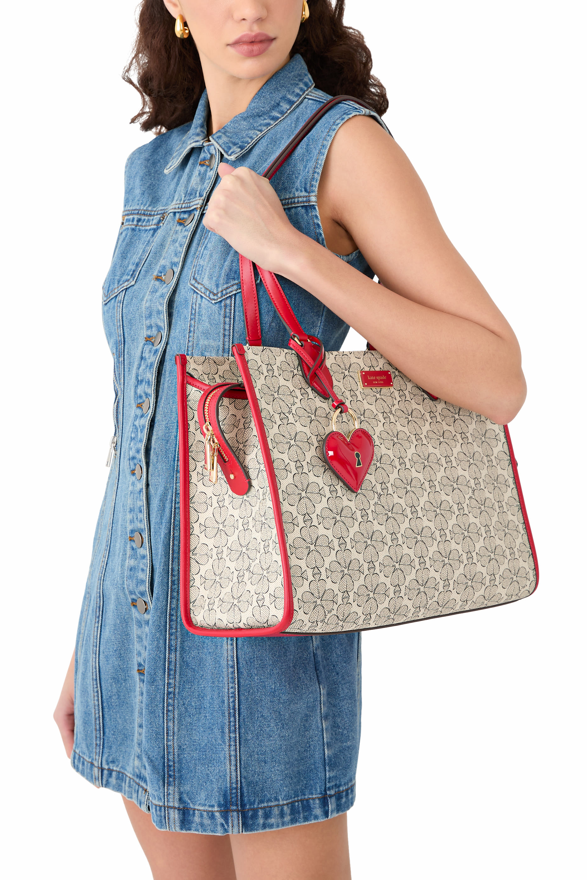 حقيبة يد متوسطة بنقشة زهور بالشكل البستوني