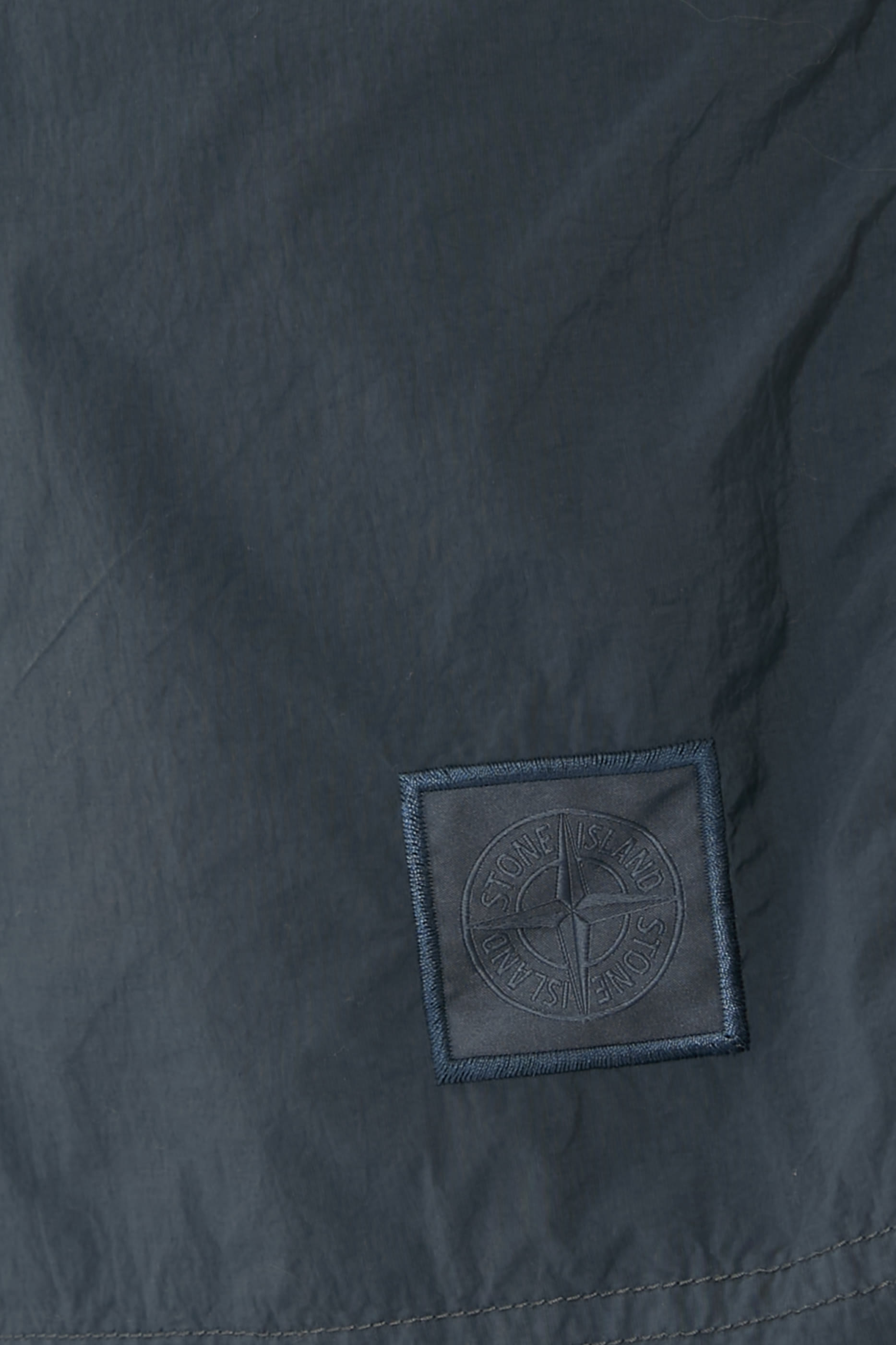 شورت سباحة بشعار الماركة