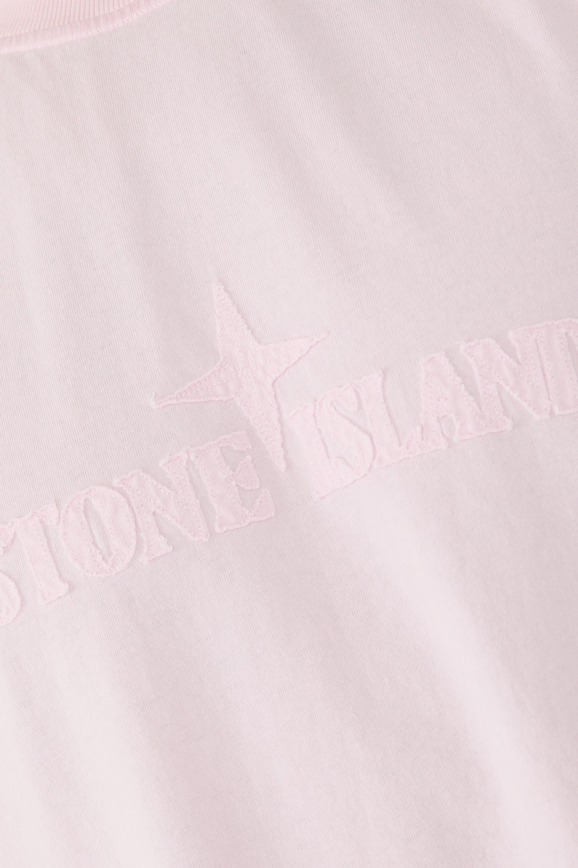 تيشيرت بقصة فضفاضة بأكمام قصيرة