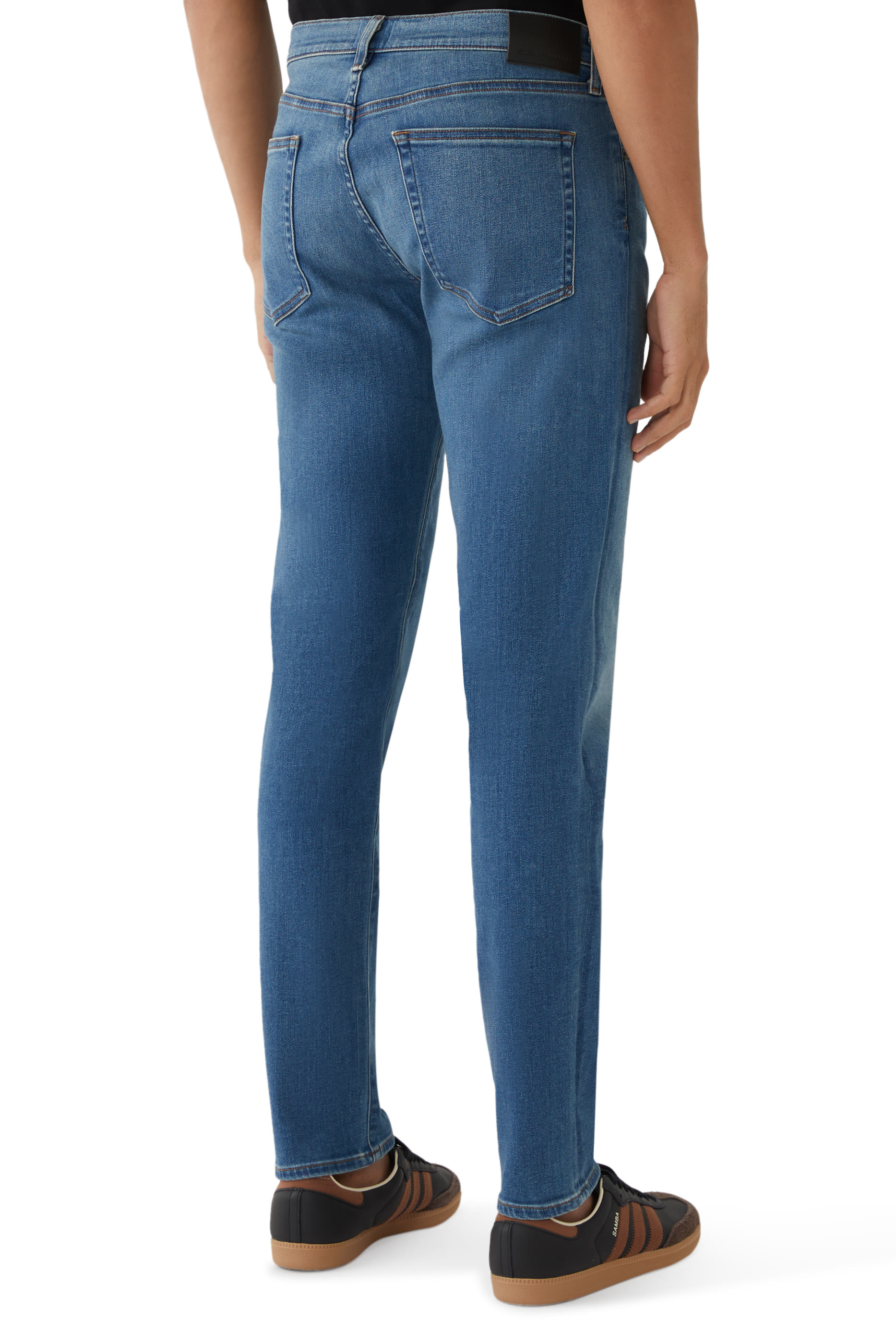 بنطال دنيم لندن بقصة ساق تضيق نحو الأسفل