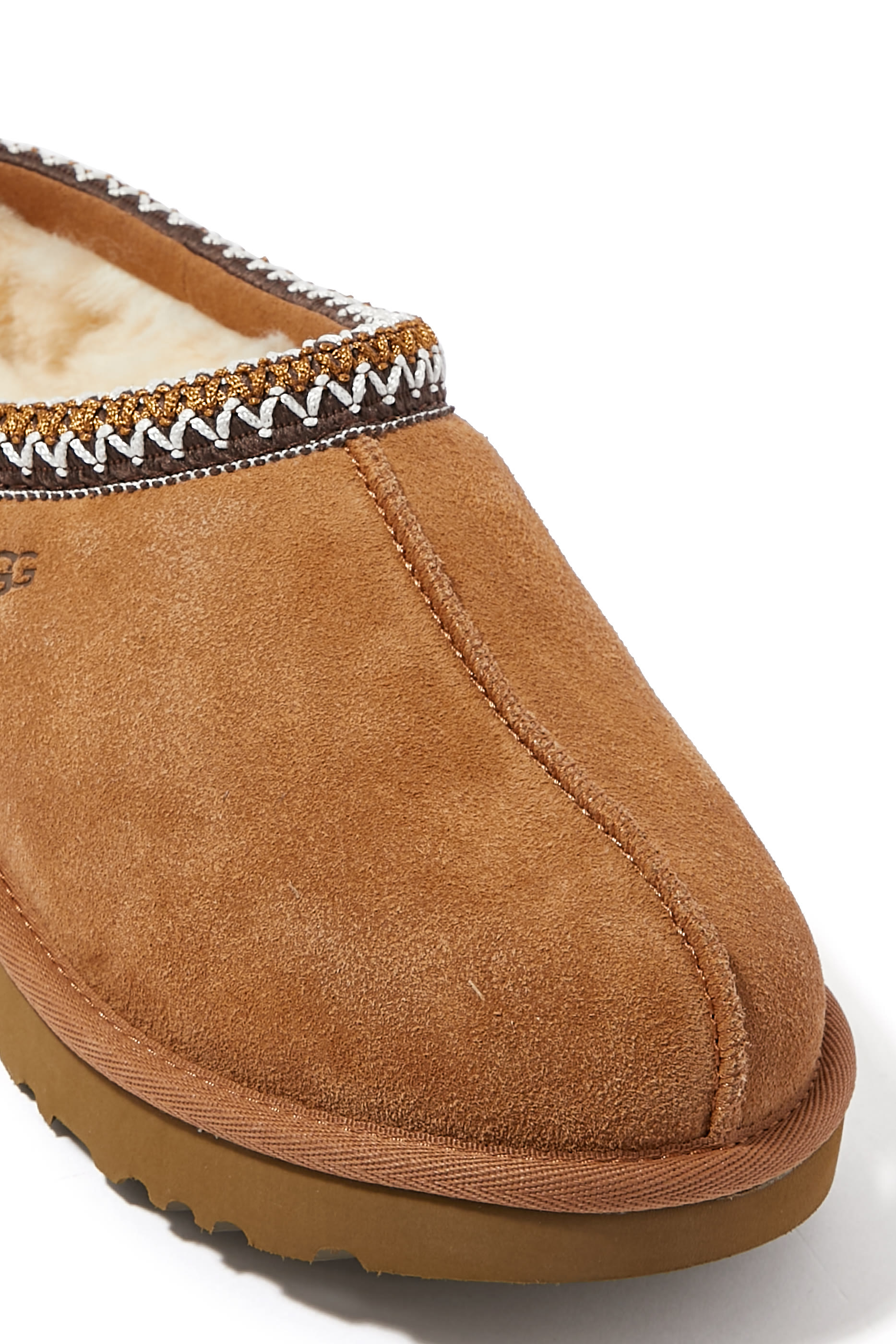 حذاء تسمان مفتوح من الخلف