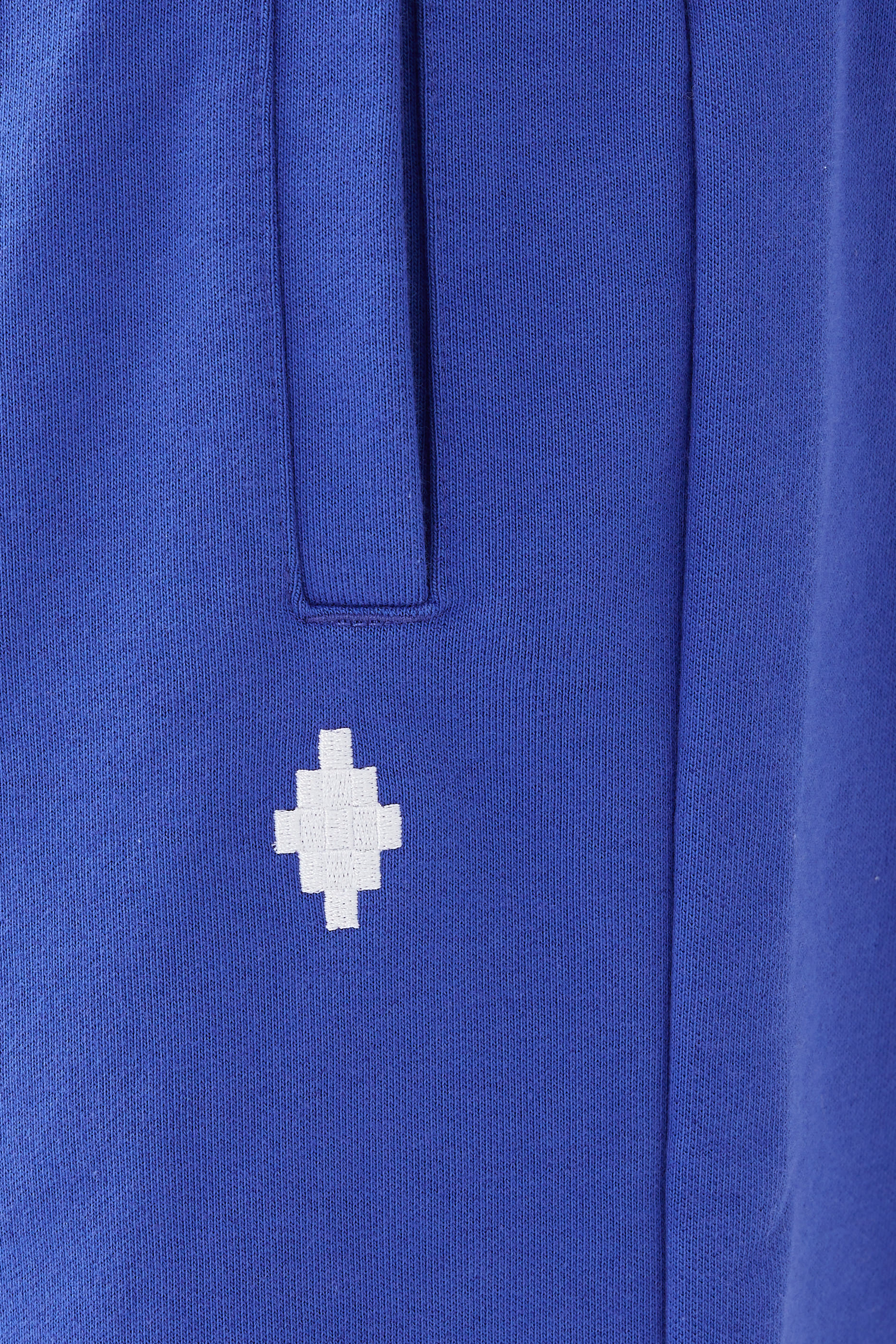 بنطال رياضي فضفاض بنقشة شعار معين