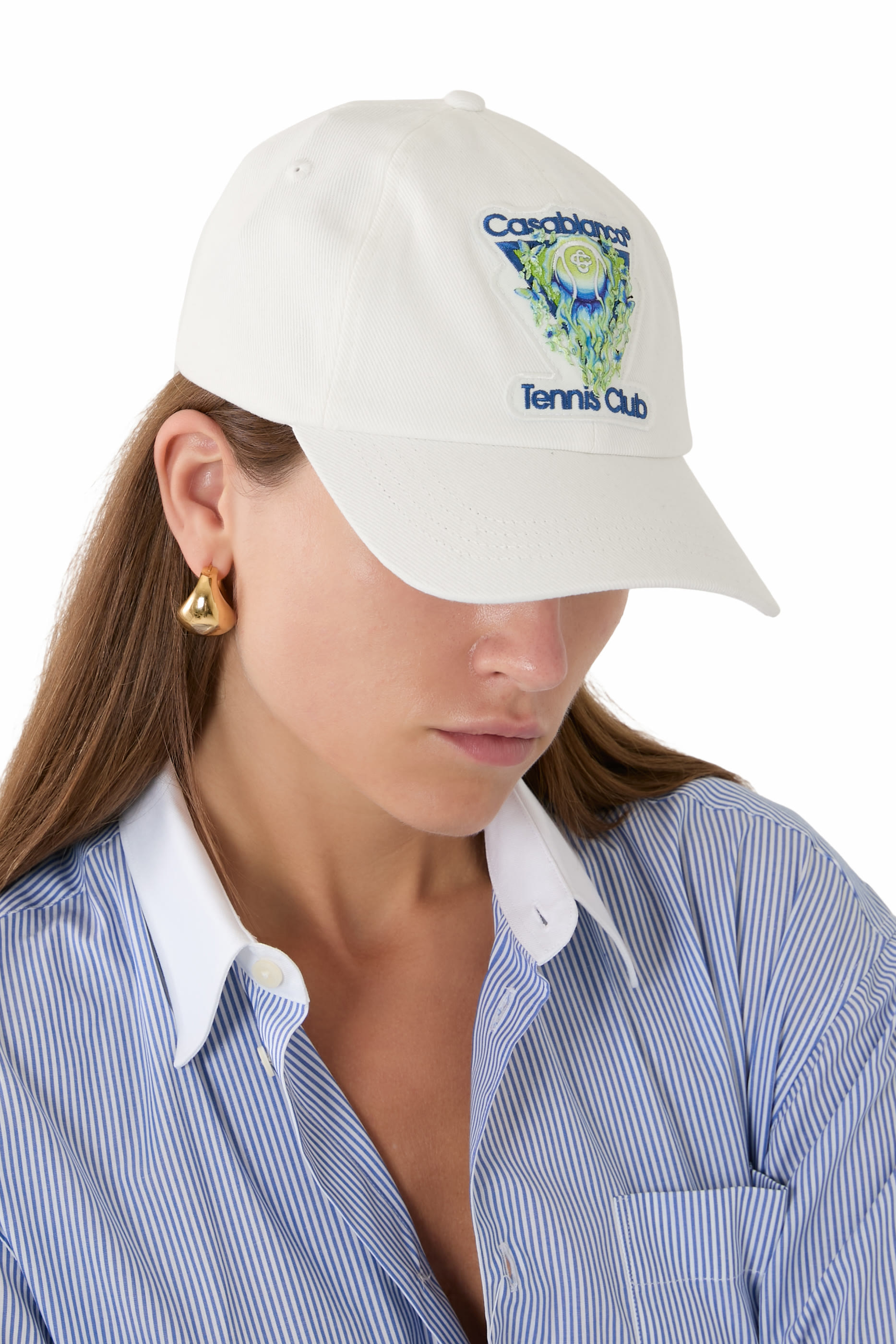 كاب بشعار كرة تنس مشتعلة