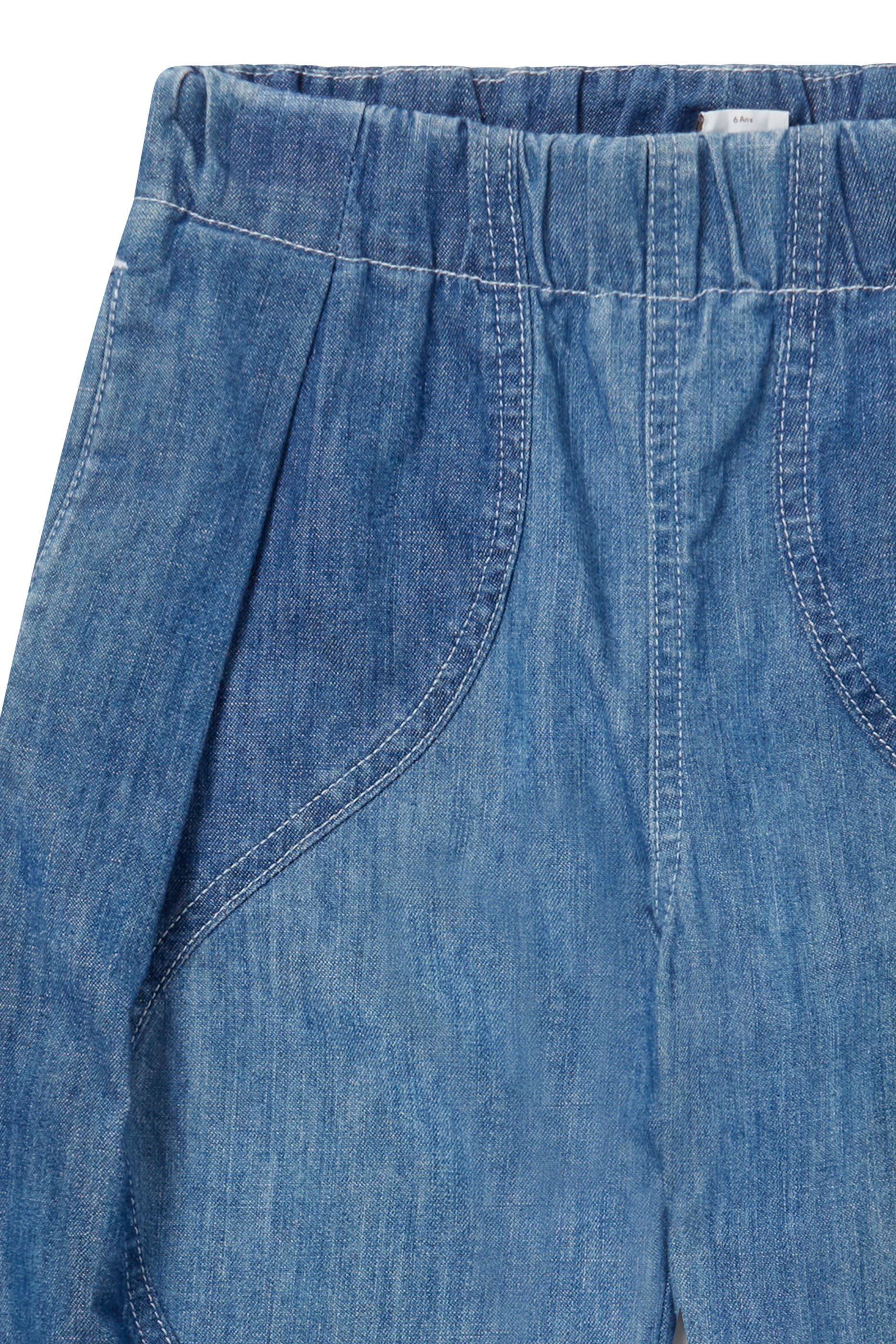 بنطال جينز بطبعات غرافيكية دنيم للأطفال