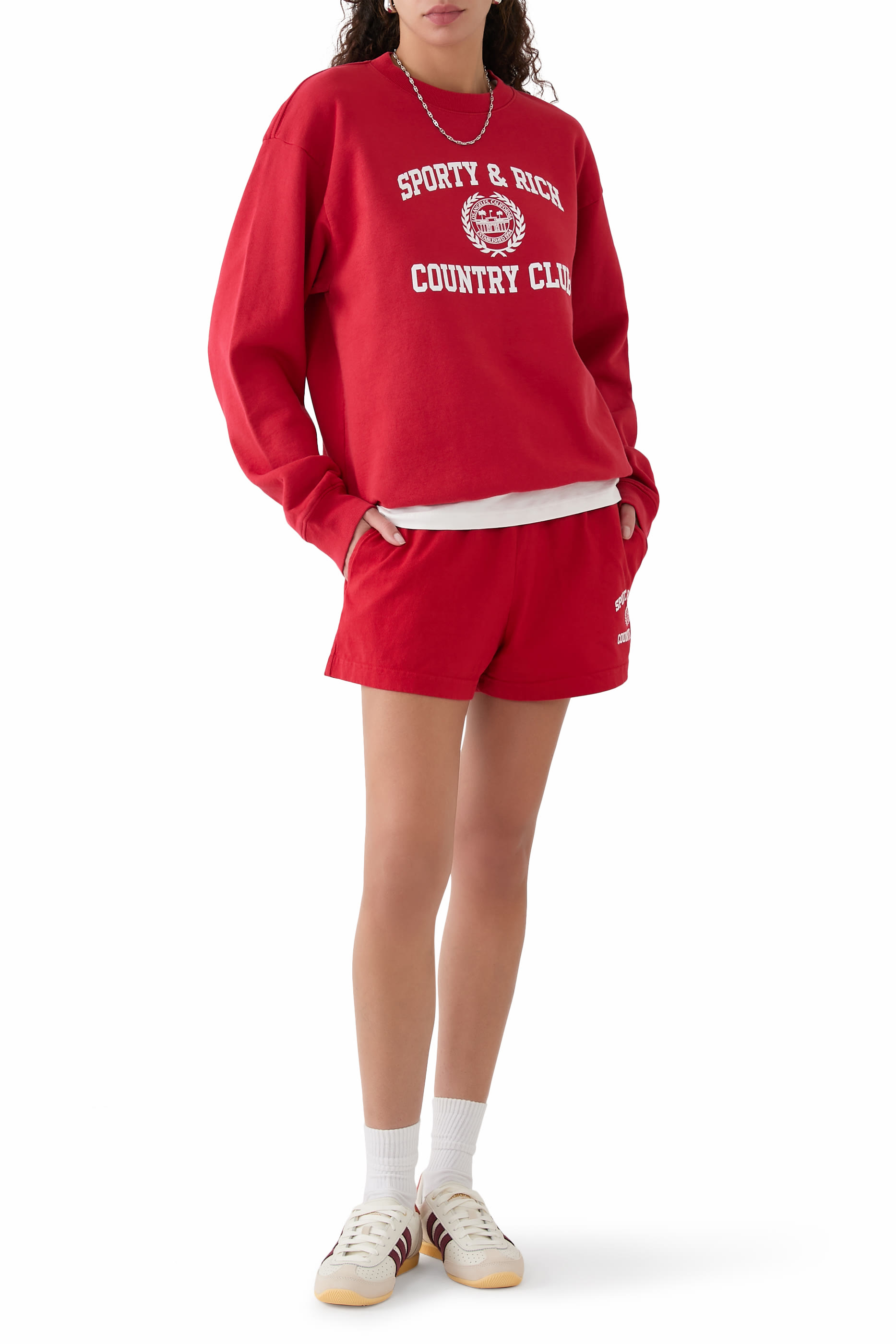 شورت ديسكو بنقشة شعار الماركة بتصميم جامعي