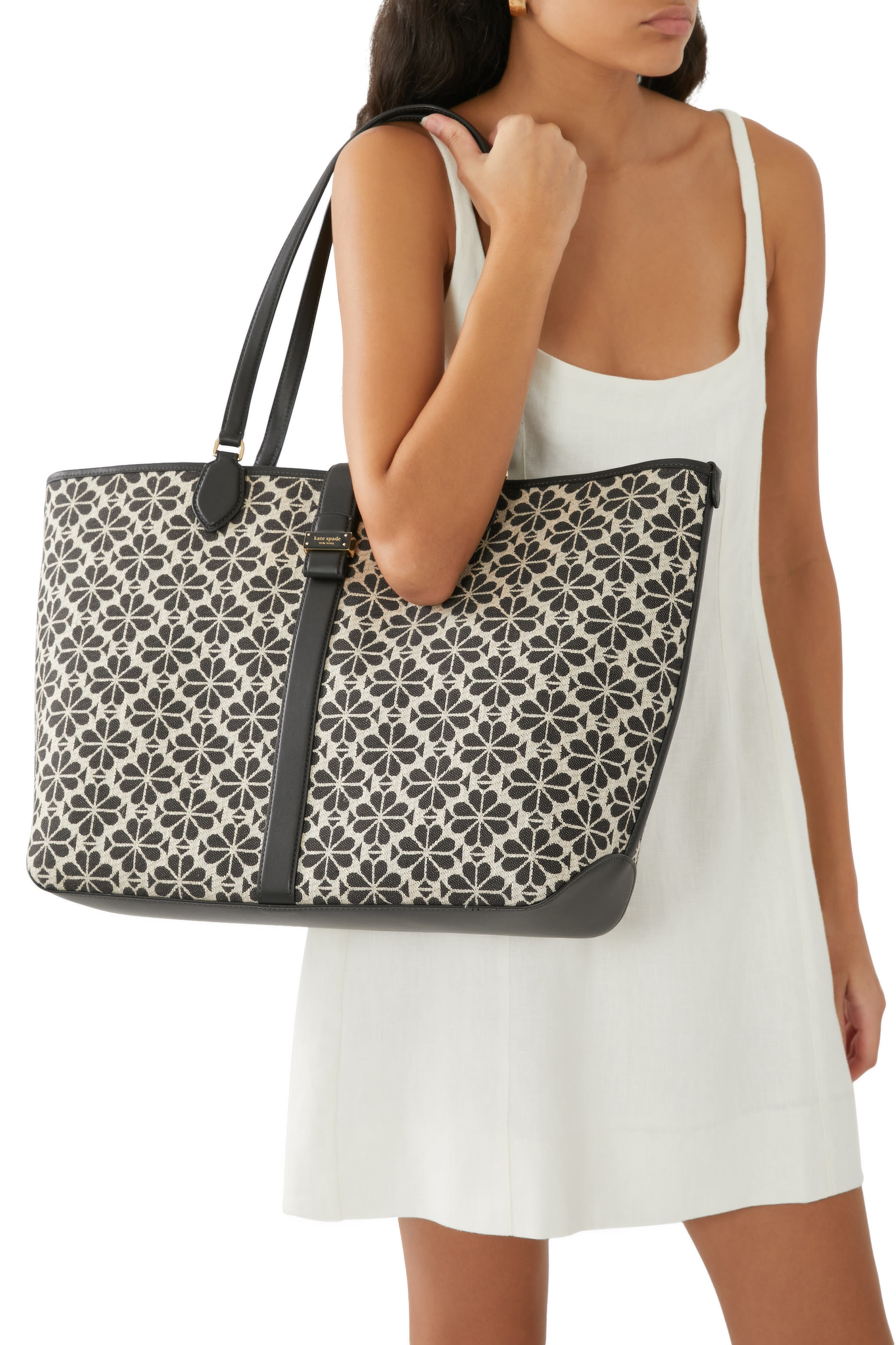 حقيبة يد قنب مطلي بنقشة زهور بالشكل البستوني