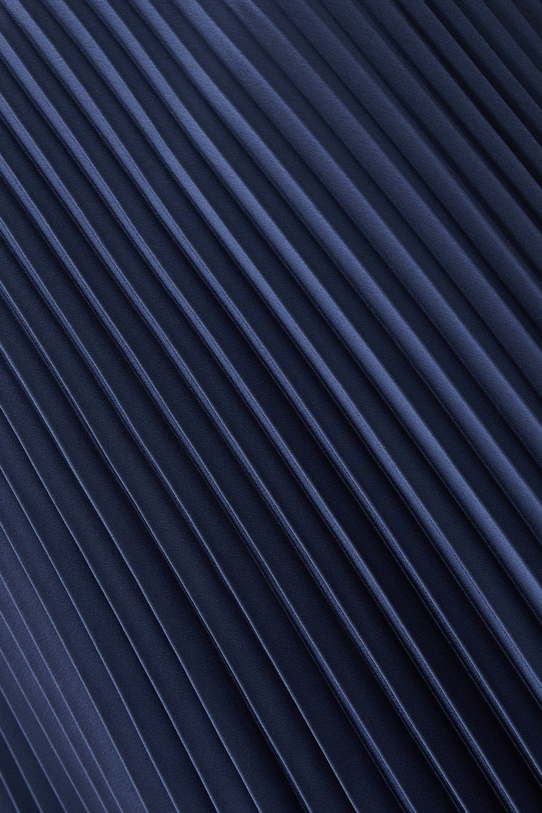 تنورة أدي بتفاصيل بليسيه  نسيج تريكو 