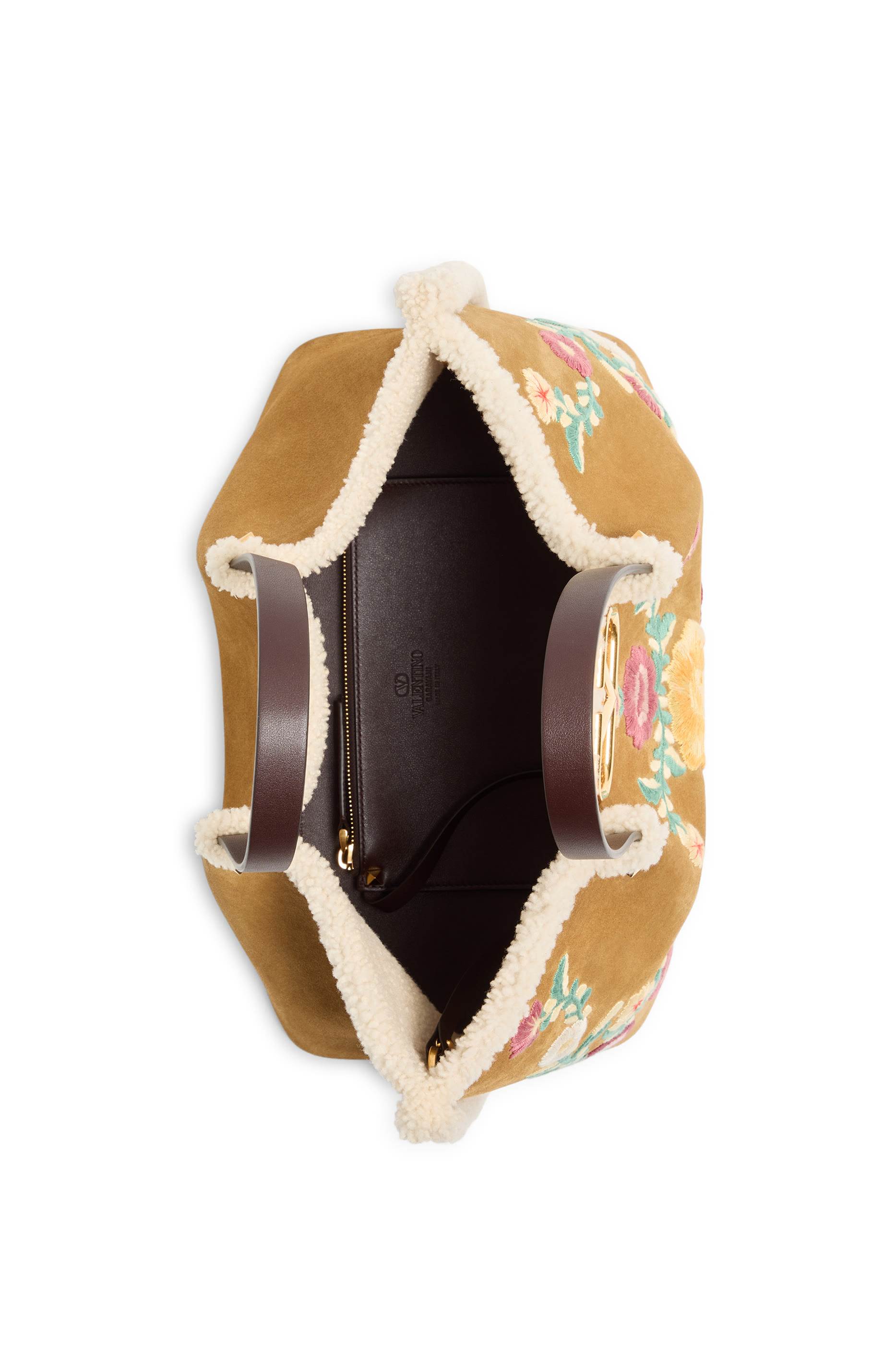 حقيبة يد مزينة بتفاصيل أزهار صغيرة