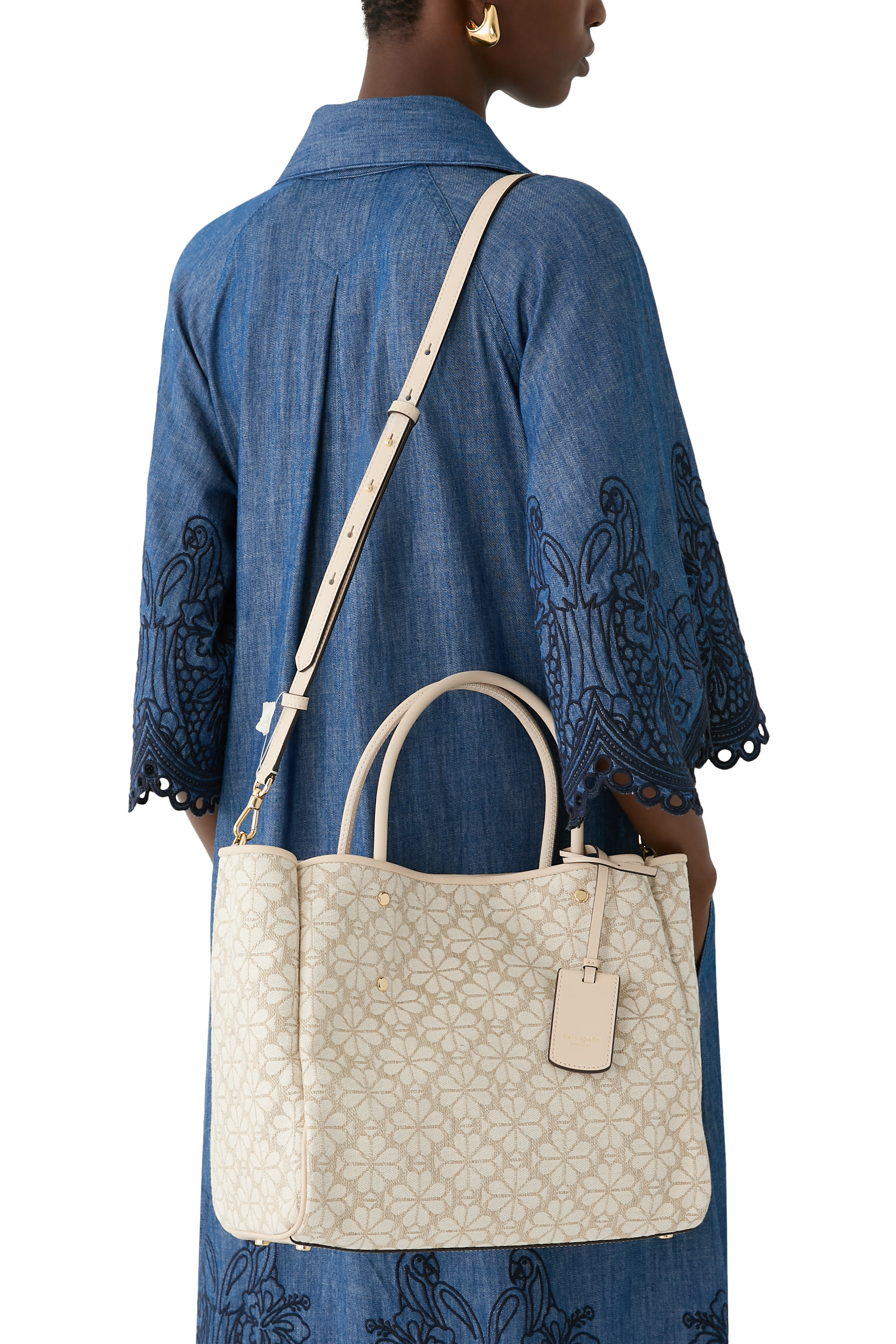 حقيبة يد متوسطة بنقشة زهور بالشكل البستوني