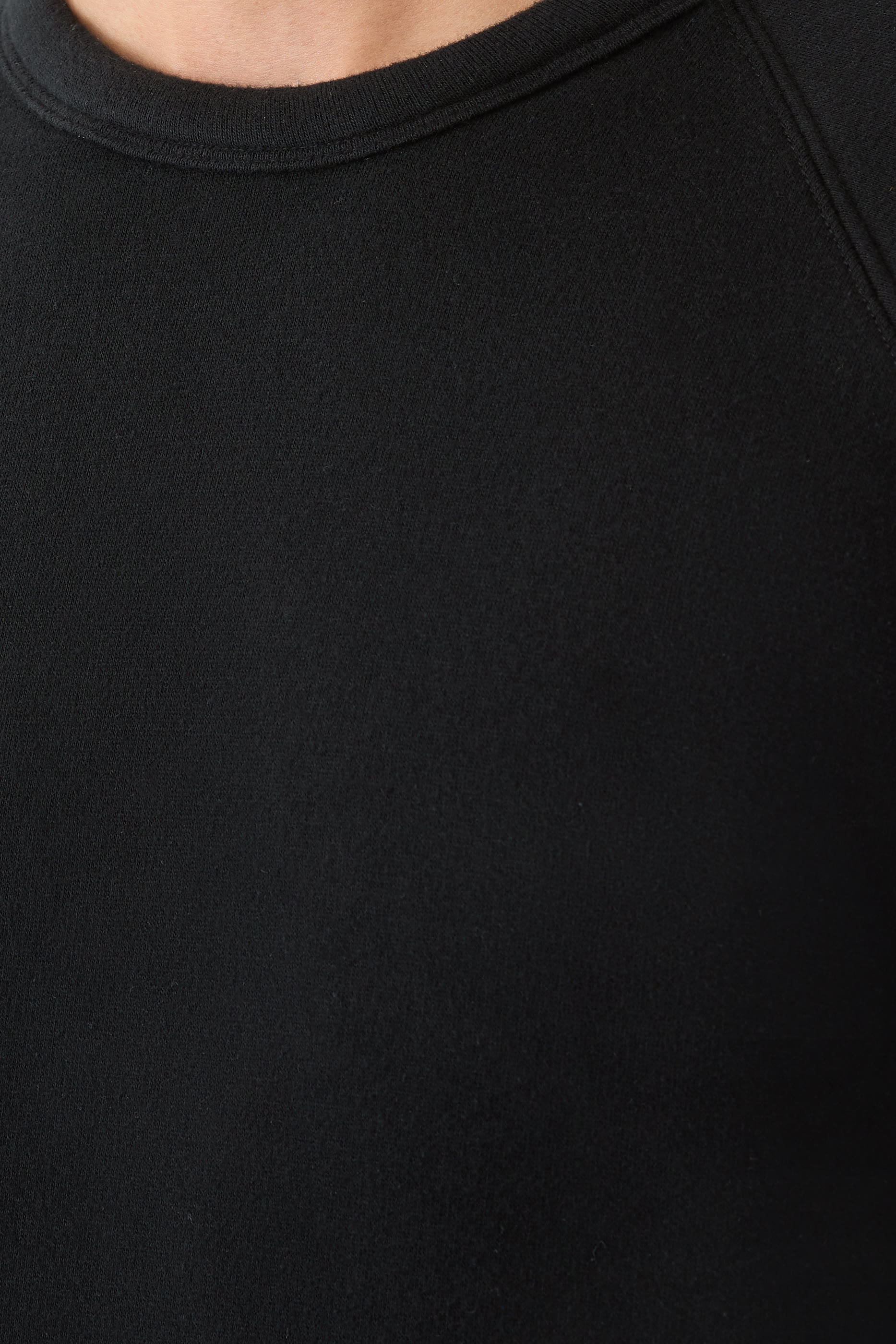 سويت شيرت بأكمام ريغلان