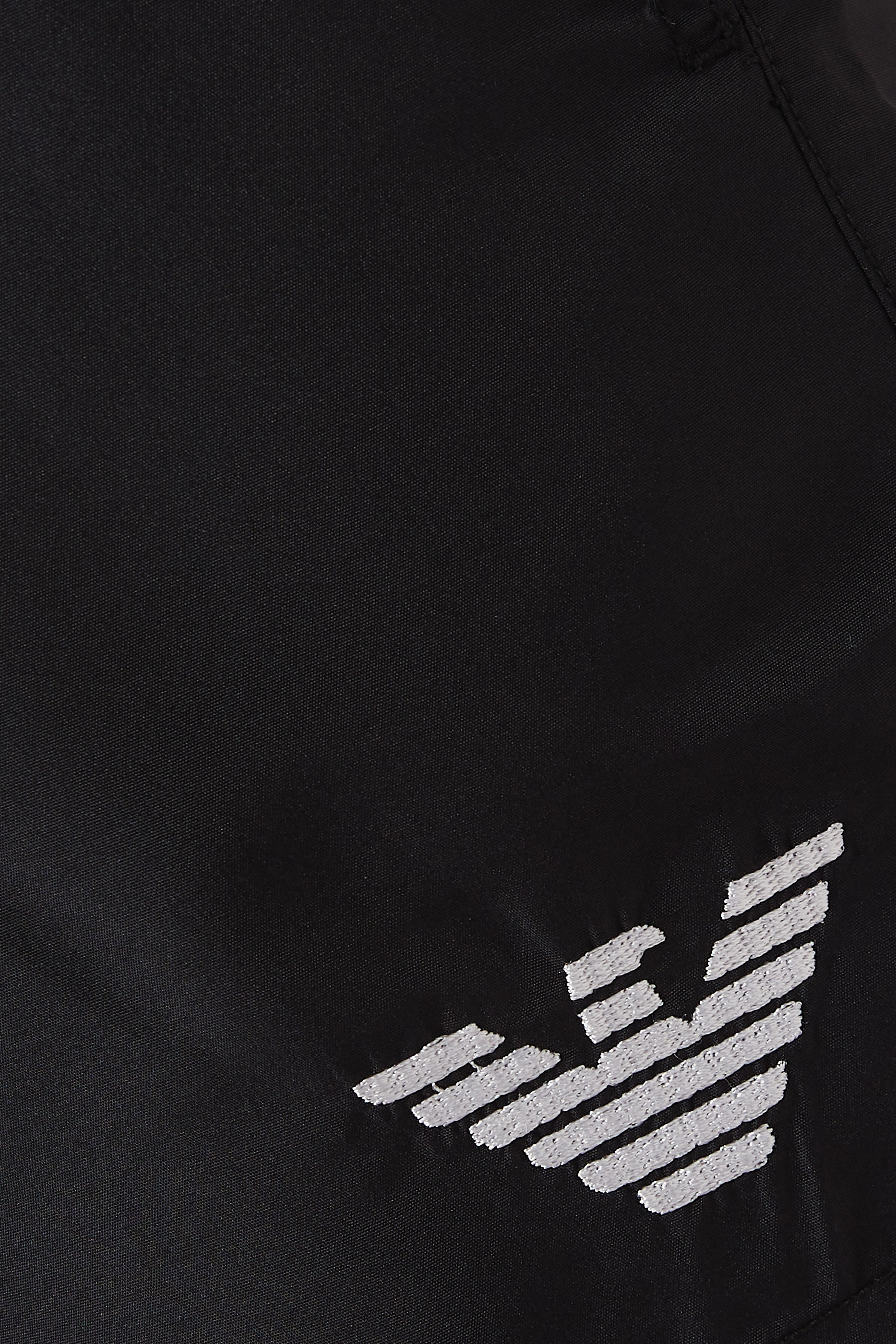 شورت سباحة بشعار الماركة