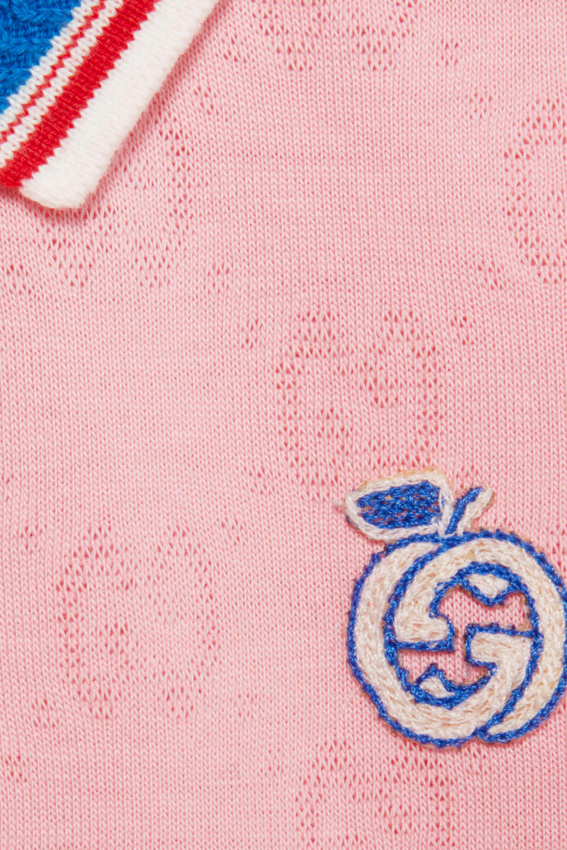 قميص بولو بطبعات حرفي شعار الماركة