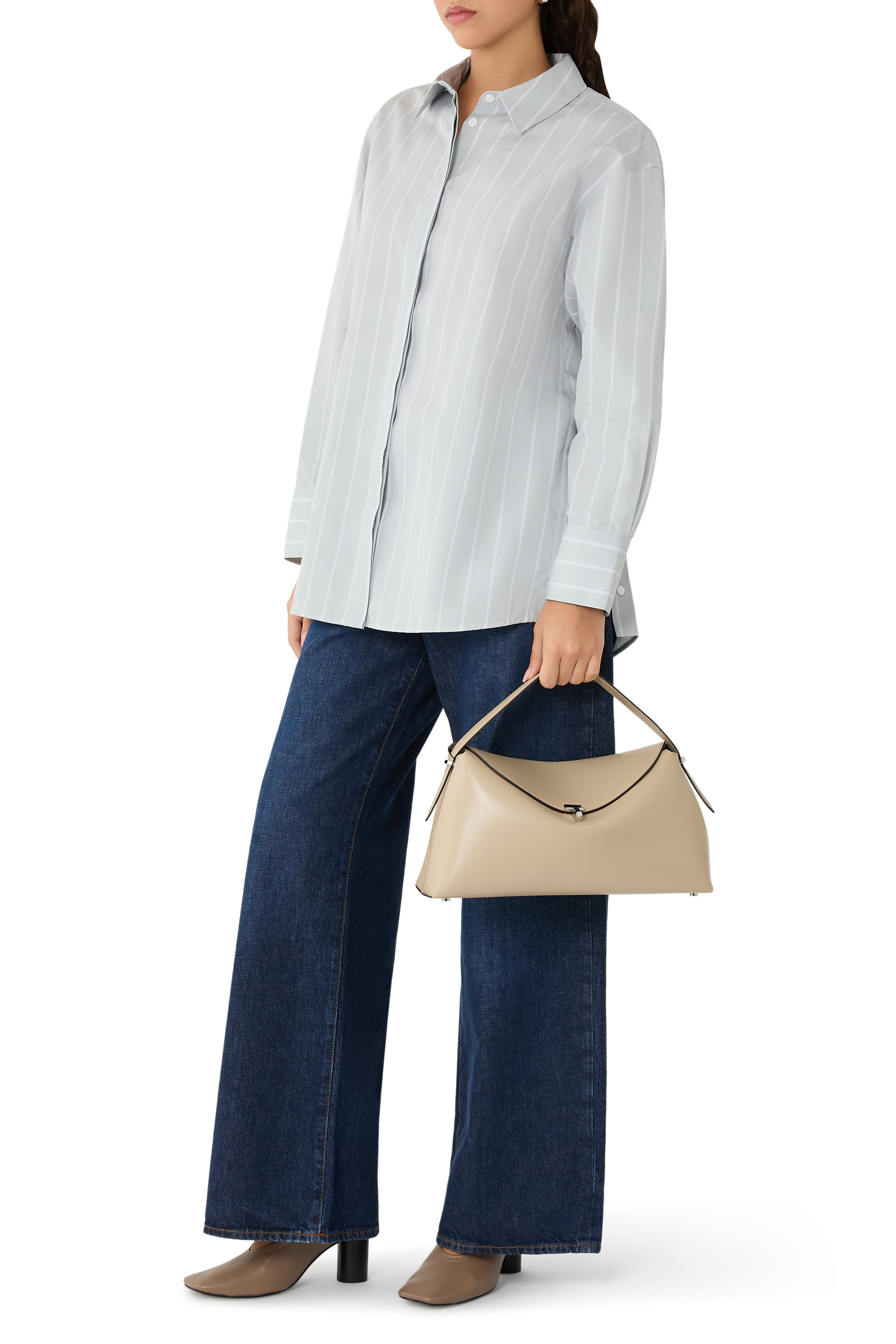 حقيبة يد بإغلاق على شكل حرف T جلد