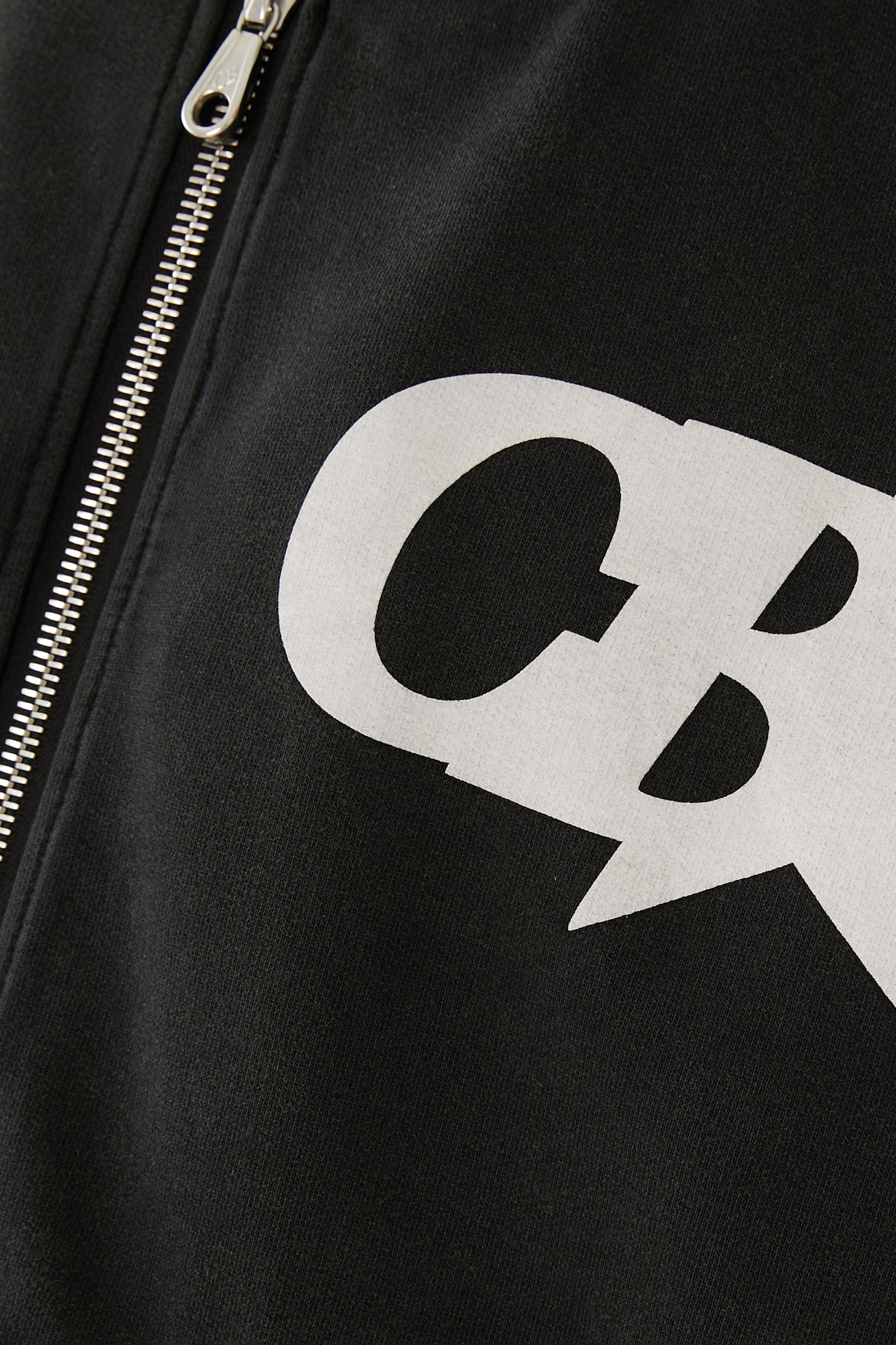 هودي بسحاب وشعار الماركة ونجمة